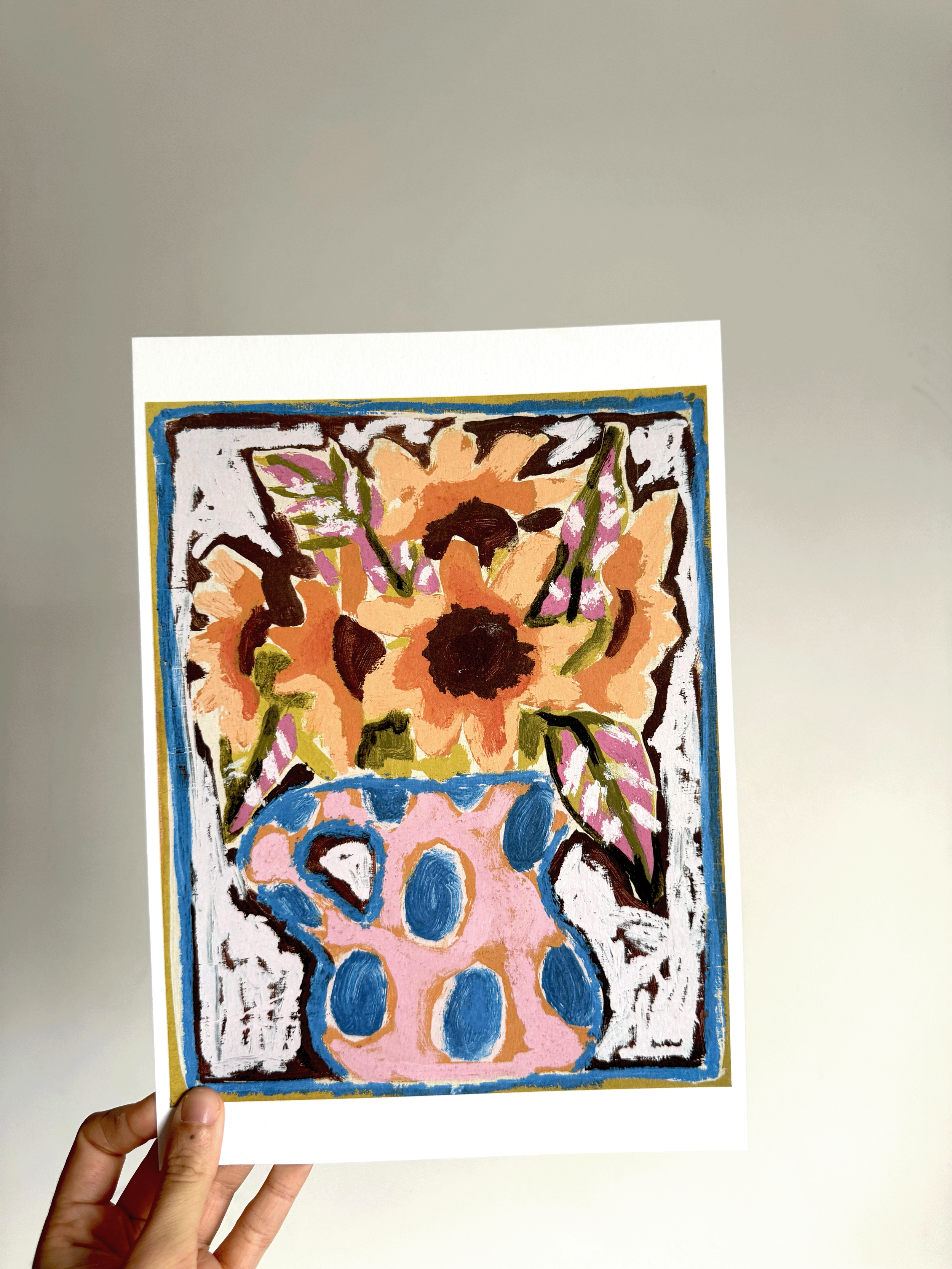 me holding print sunflowers1.png