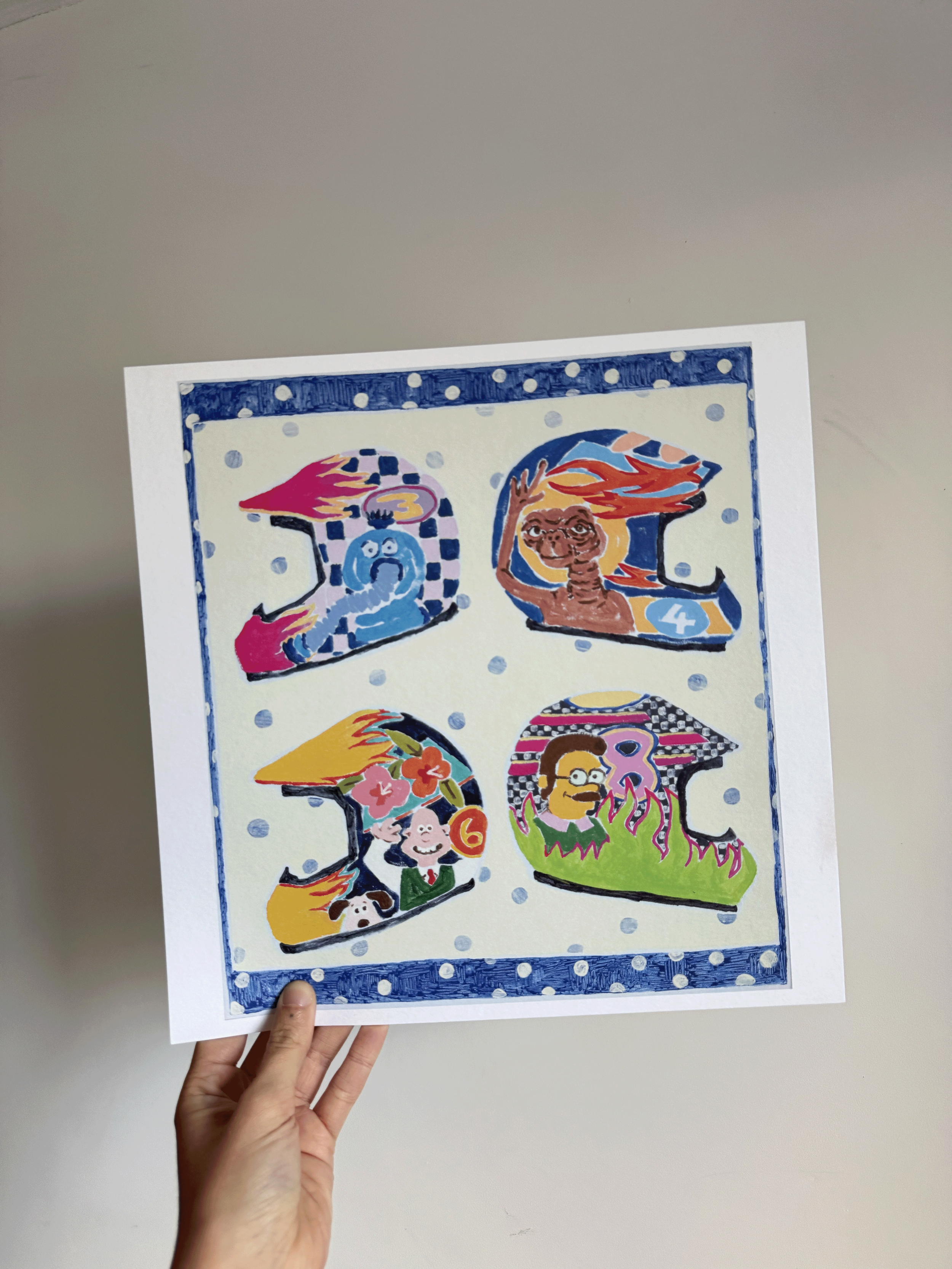 helmets square print holding it.png