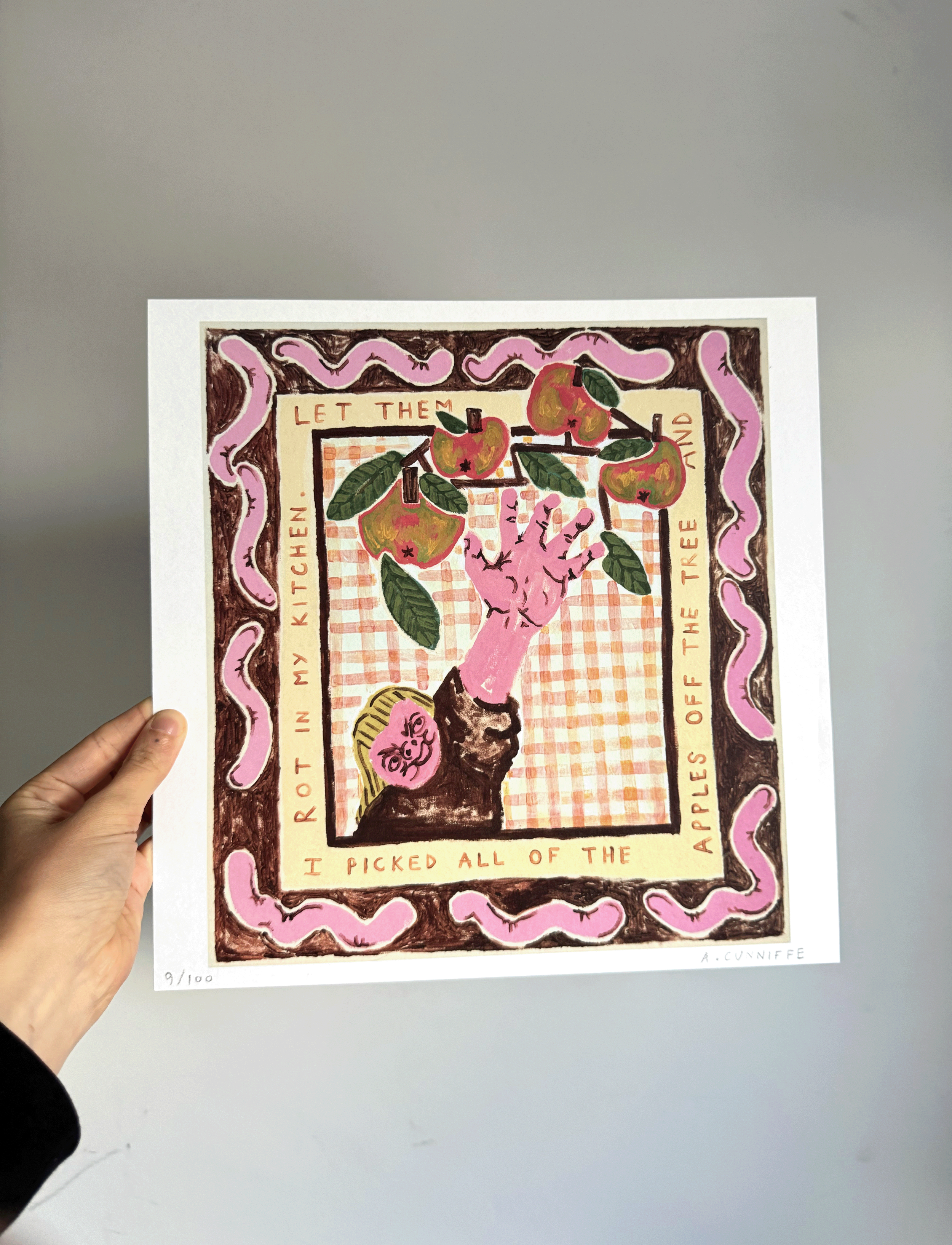 me holding prints.png