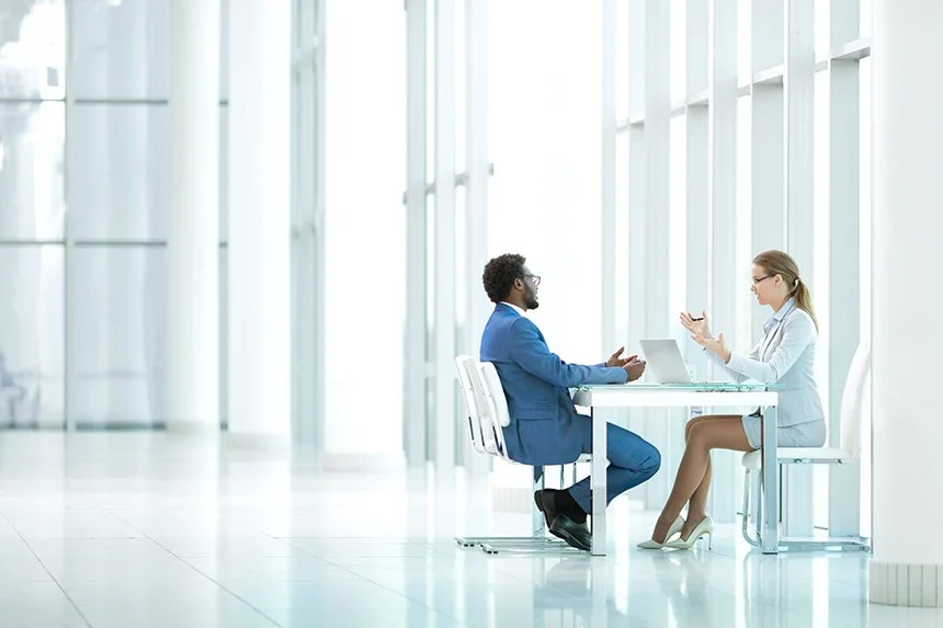 medical sales rep discusses imaging equipment purchase with hospital administrator