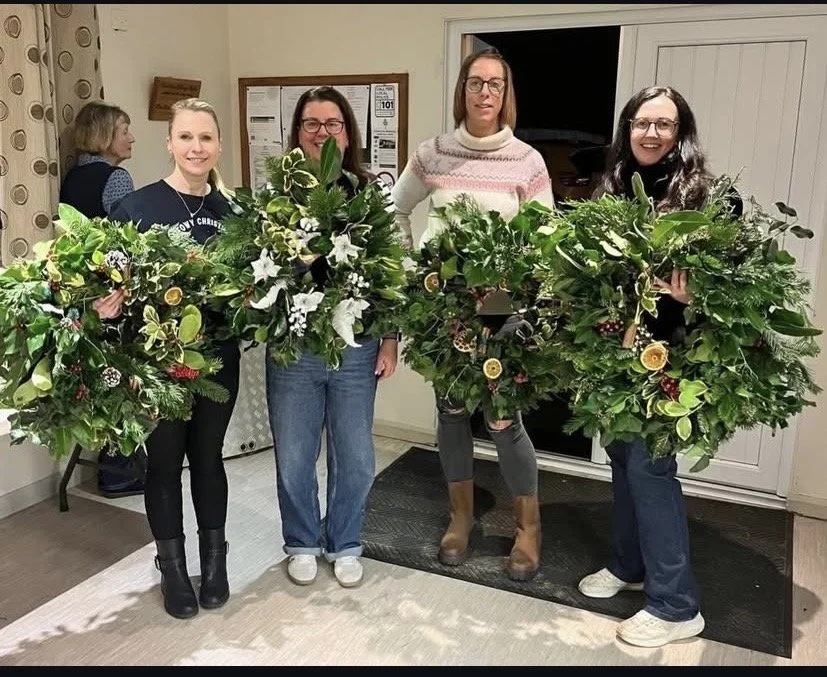 Claire Matthews MGC secretary and members at Christmas wreath evening 