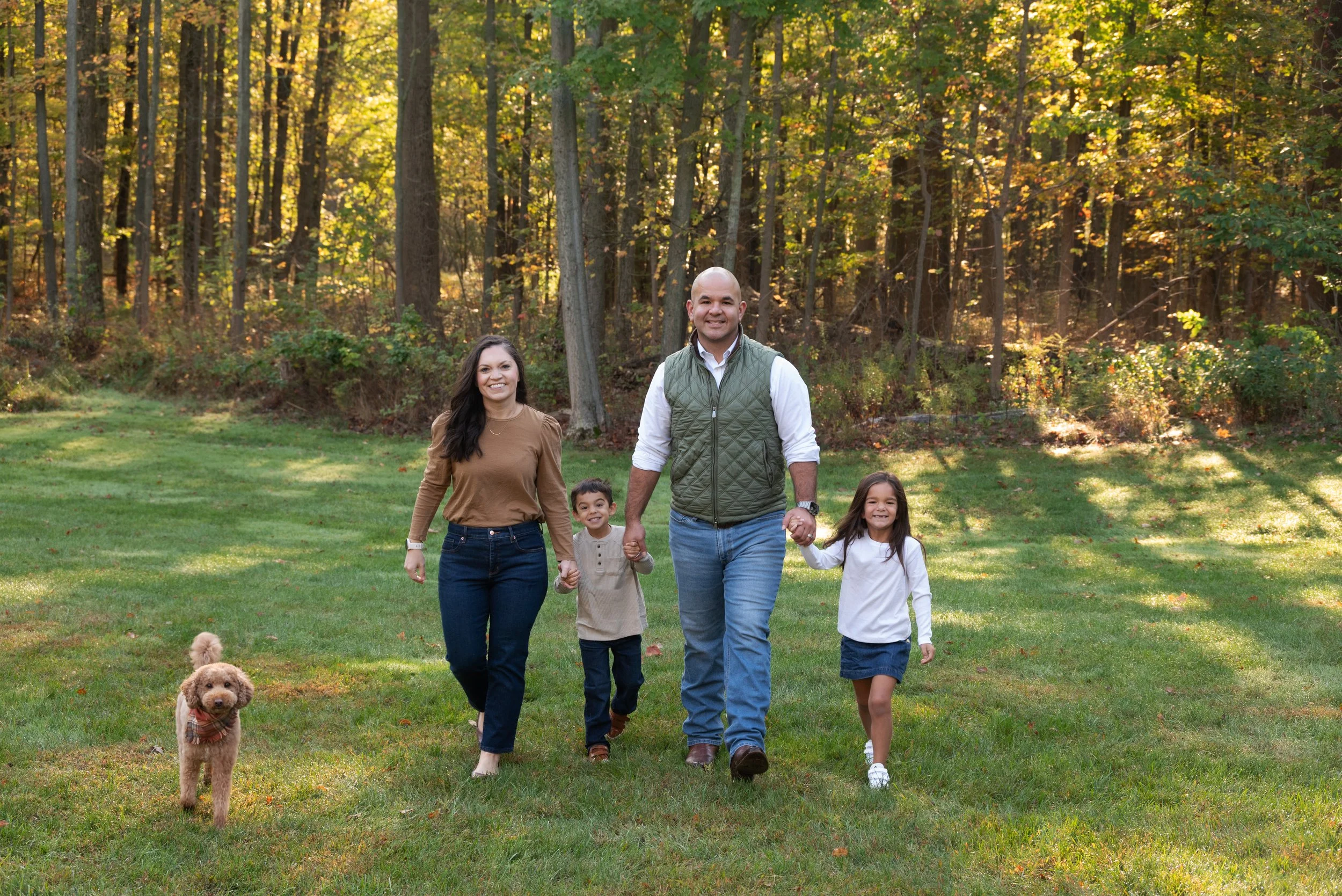 family walking with dog
