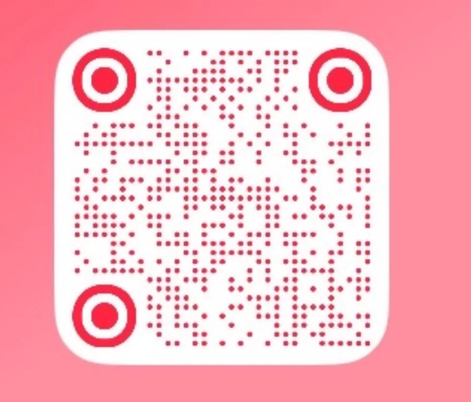 A white and red QR code on a pink background.