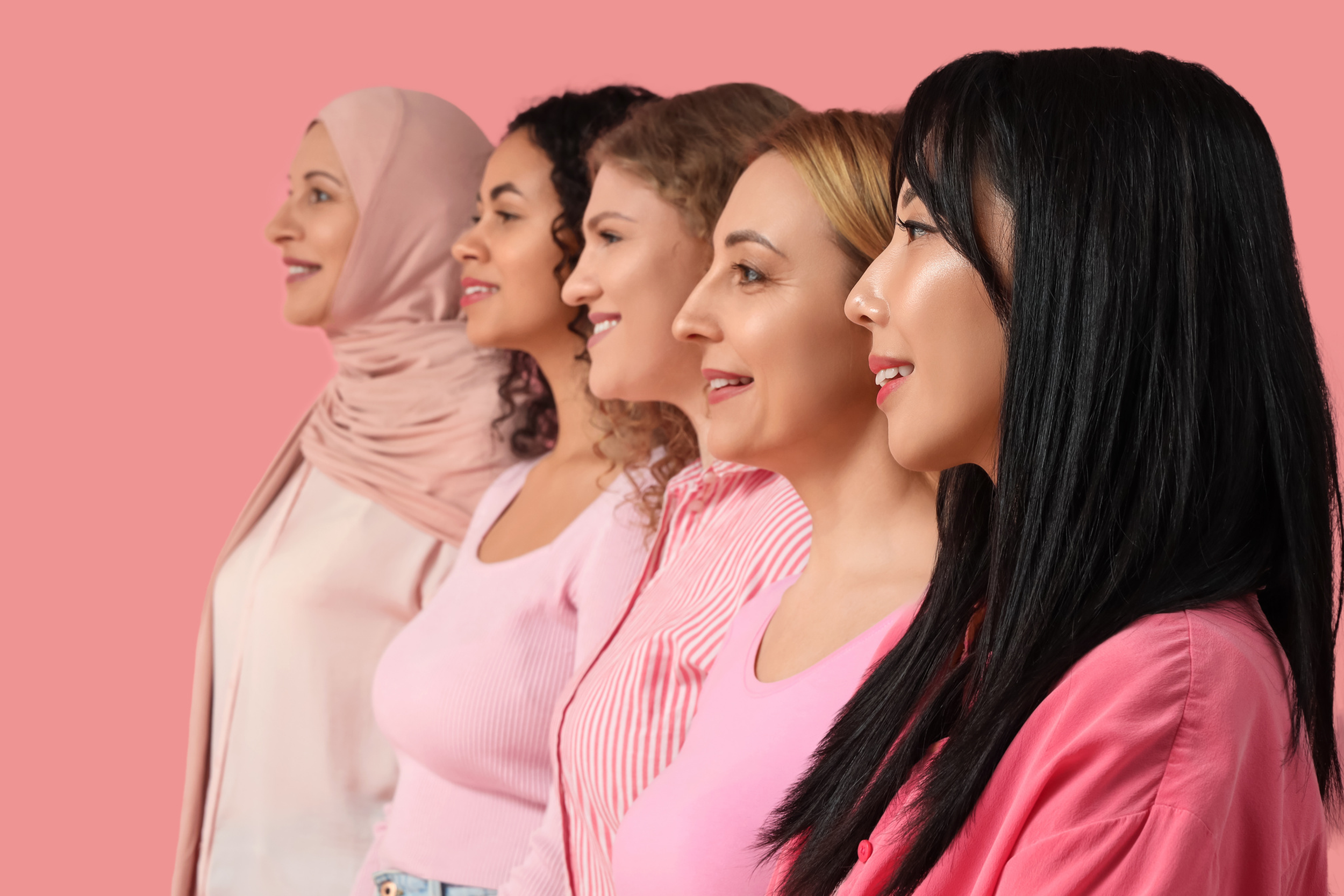 A group of diverse women smiling and celebrating together, representing empowerment and unity for Women’s Month.