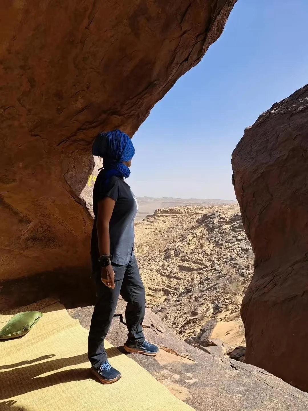 Looking out over the desert from a rock overhang