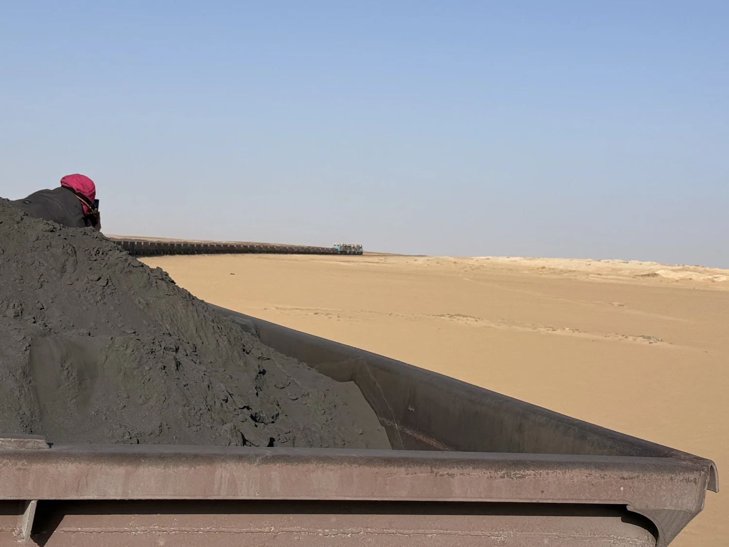The iron ore train stretching away across the Sahara