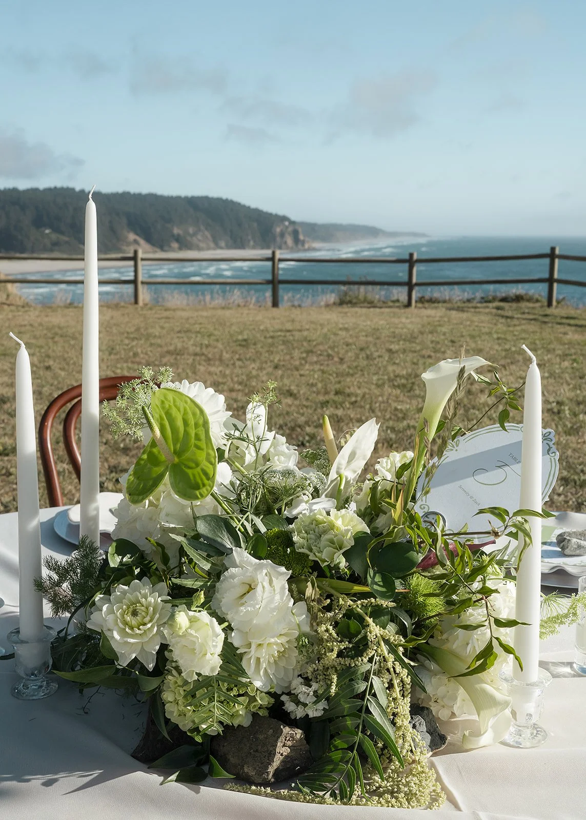 white and green florals, Oregon coast wedding. Photo credit: jesib.com