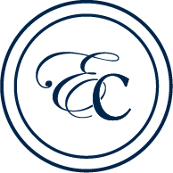 A black circular logo with a stylized snake and the letter 'C' in the center, outlined in blue.