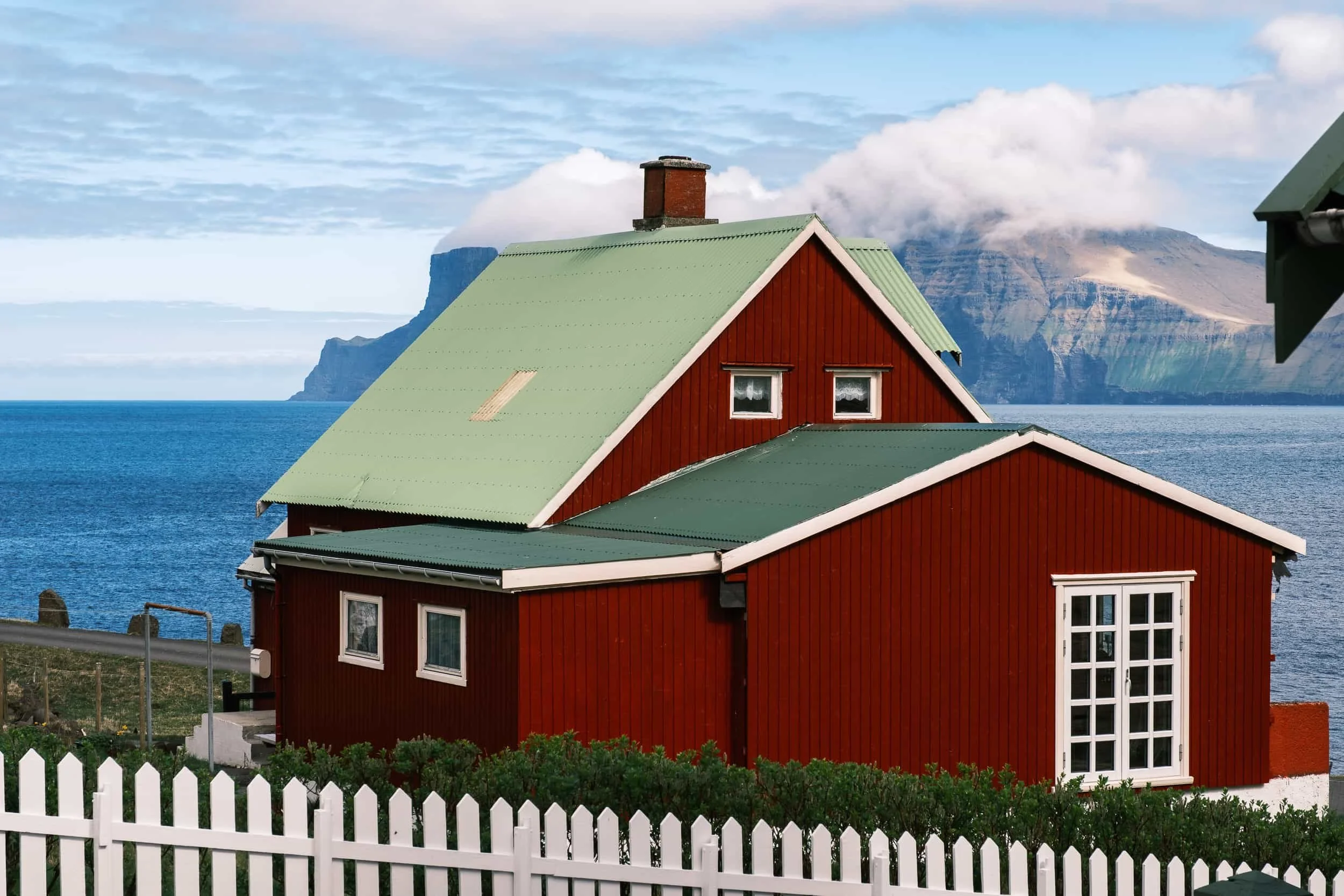 Detail of a traditional red house: capturing the aesthetics of traditional Faroese architecture.