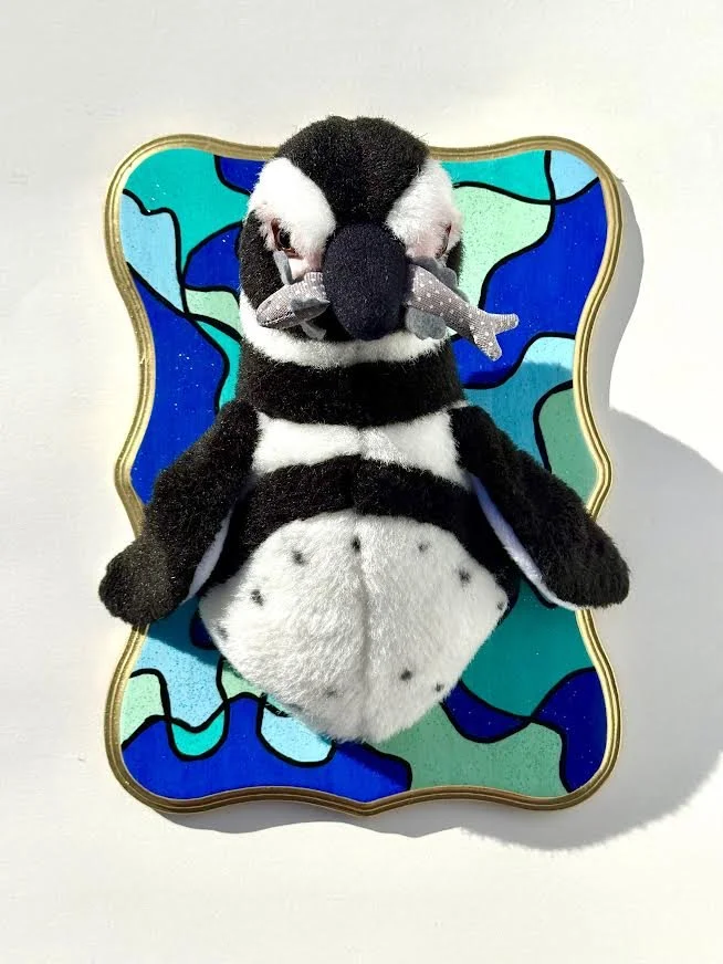 Penguin With a Fish Plaque
