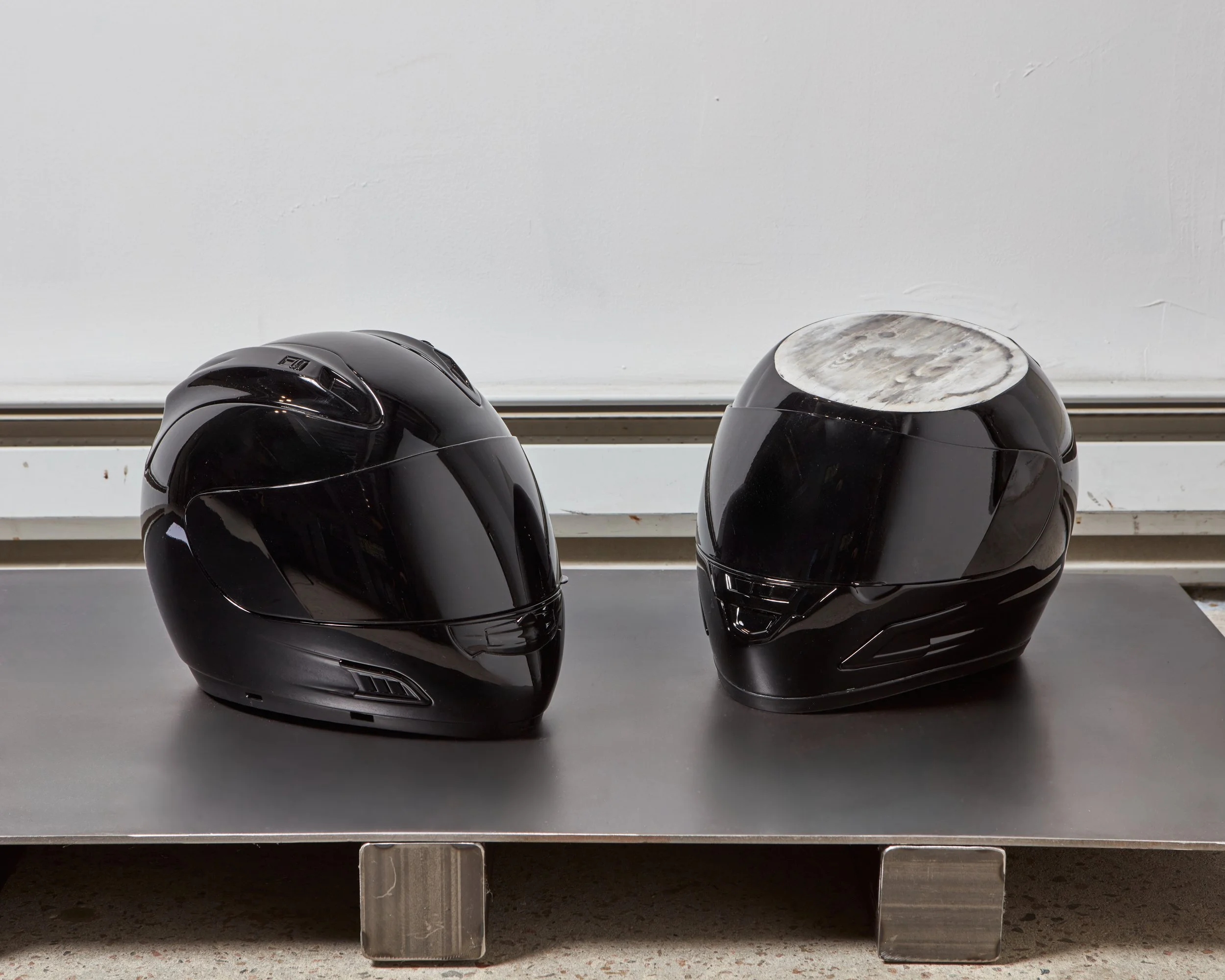  Symphysis, 2025 
 Sectioned motorcycle helmets, acrylic 