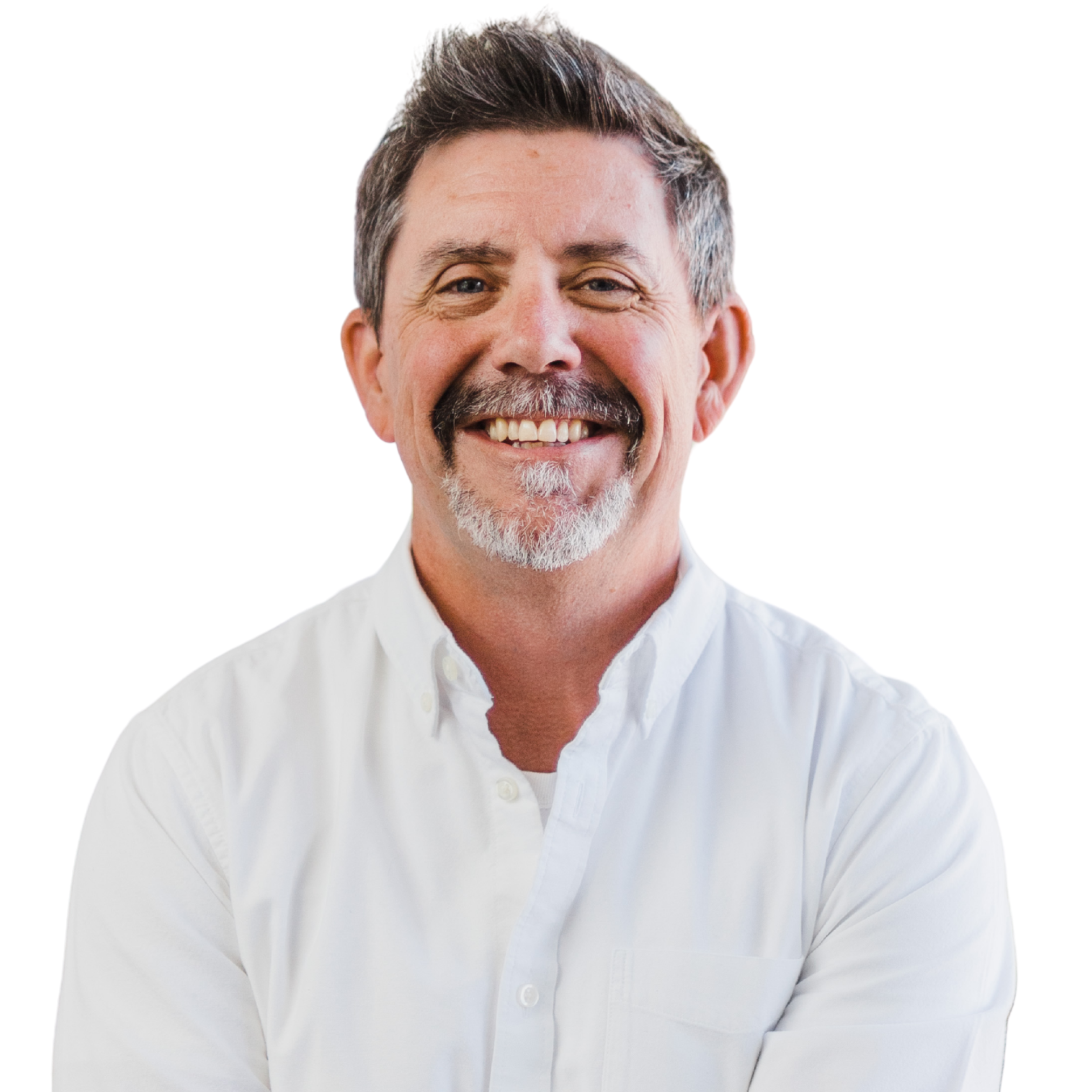 A smiling middle-aged man with short dark hair, a gray beard, and mustache, wearing a white button-up shirt with a collar, against a plain white background.