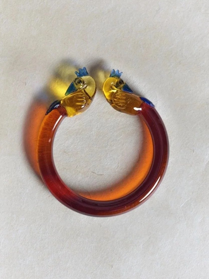 Peacock amber