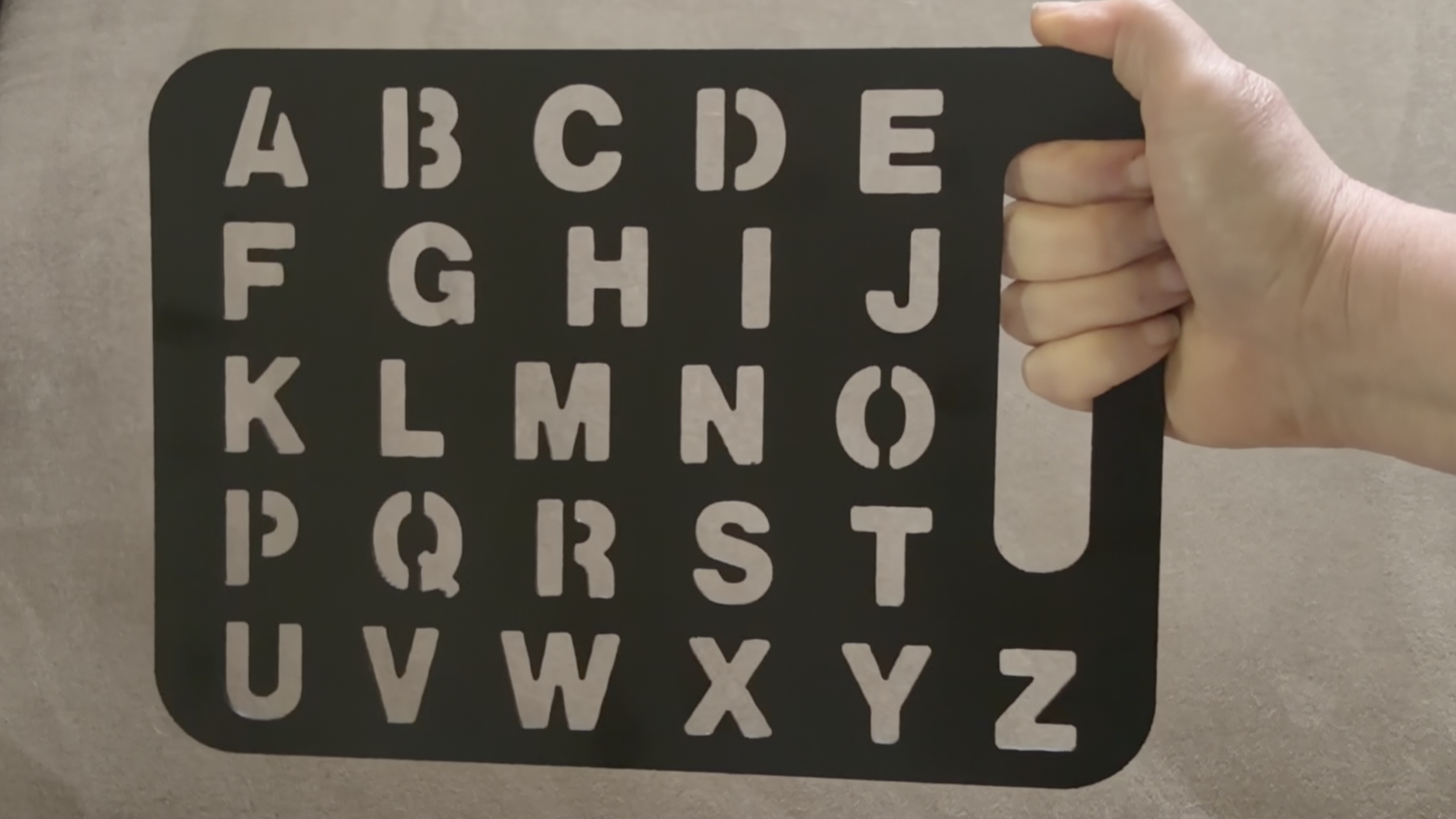 letterboard-and-hand.png