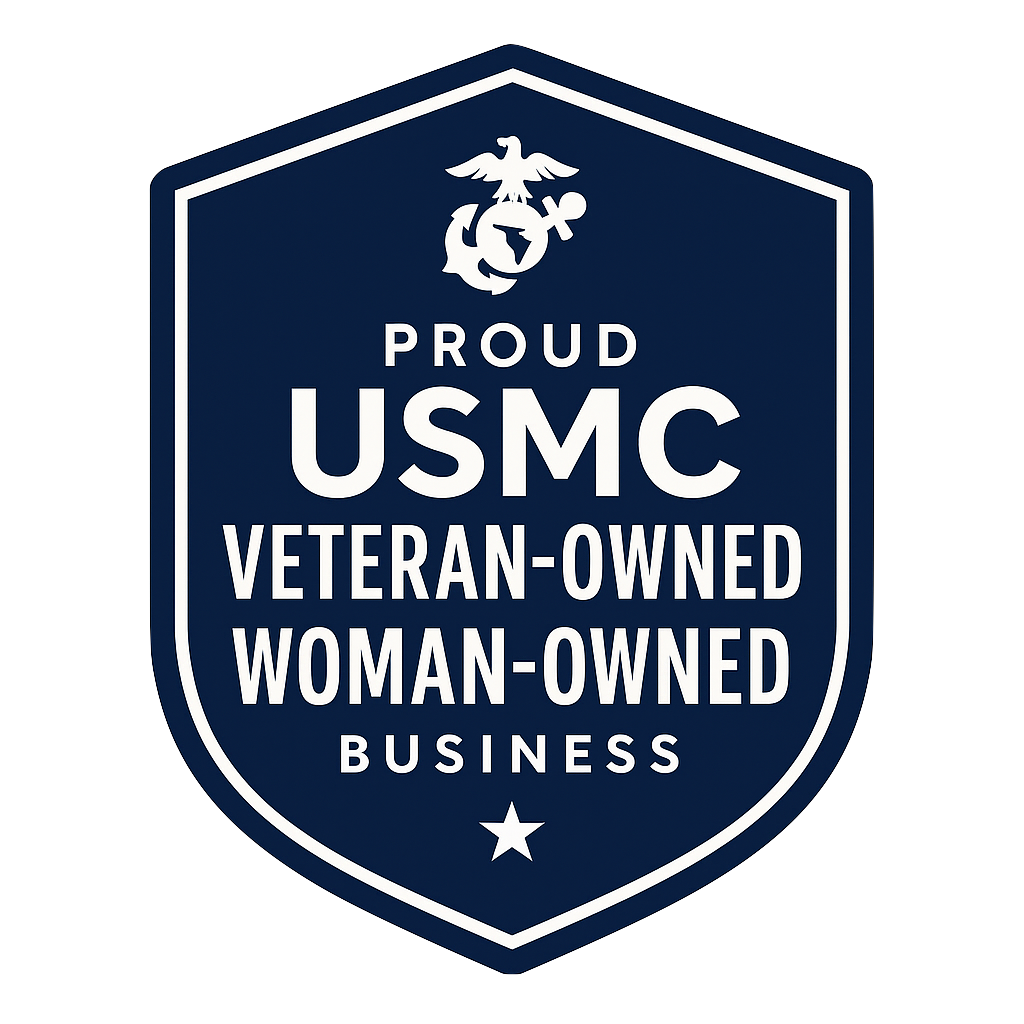 A badge with the US Marine Corps emblem at the top, stating "Proud USMC Veteran-Owned Woman-Owned Business" in white text on a navy blue shield background.