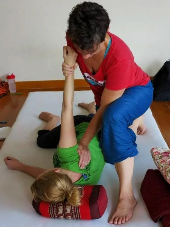Practicing Thai massage, Chiang Mai, Thailand