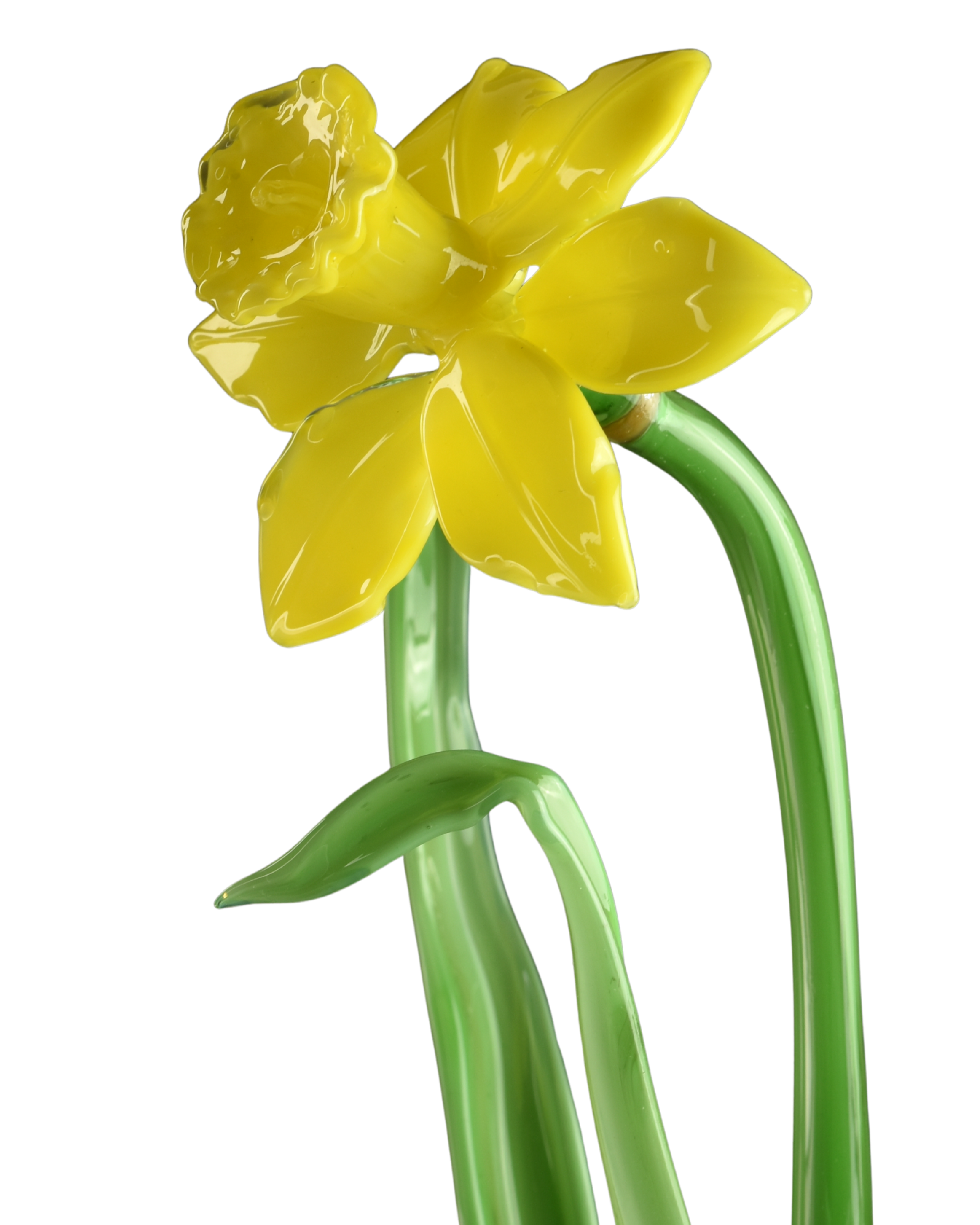 Yellow tulip flower made of shiny, transparent plastic with green stems against a black background.