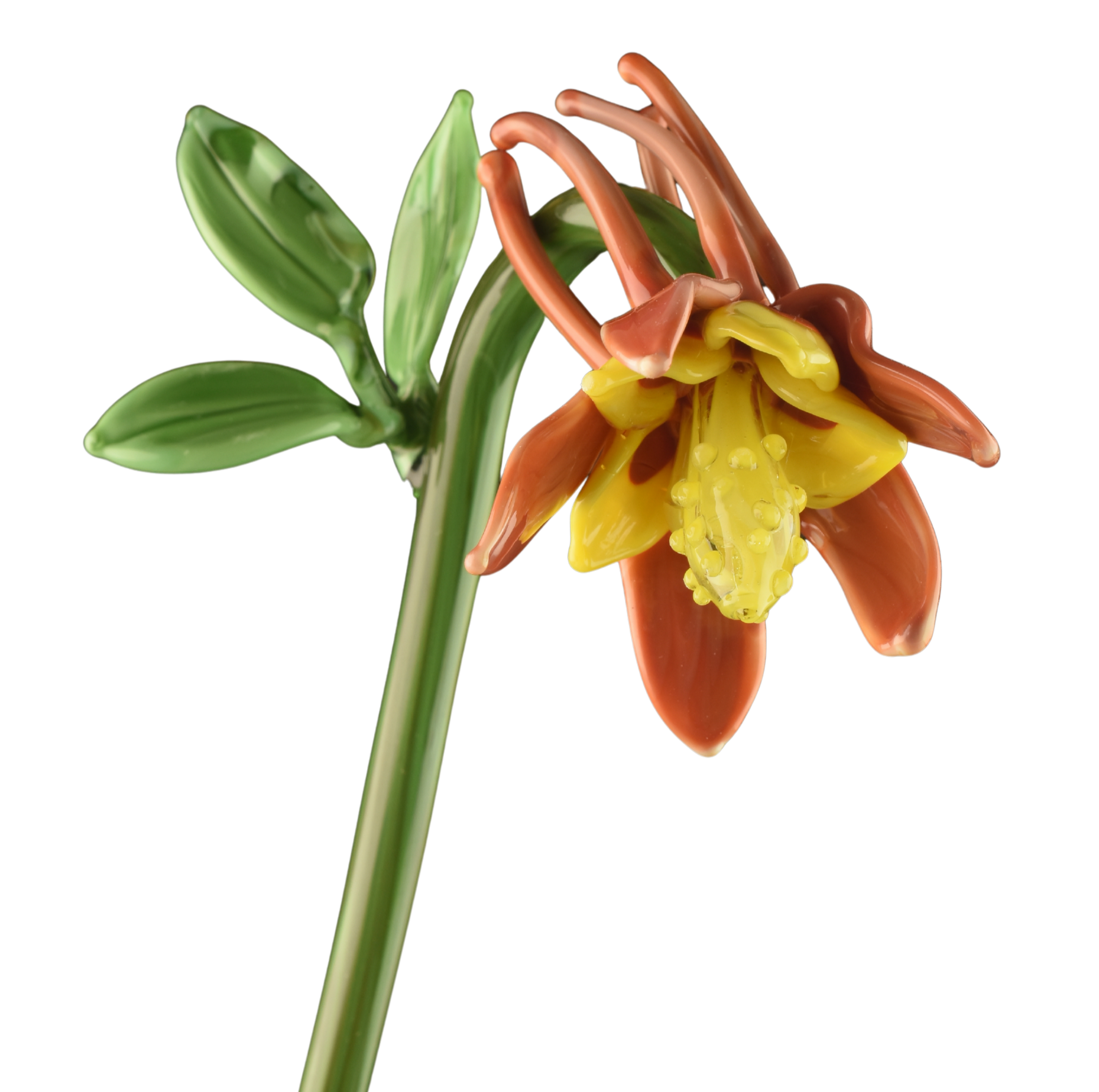 A colorful, glass sculpture of a flower, featuring green leaves, brownish-orange petals, and a yellow interior.
