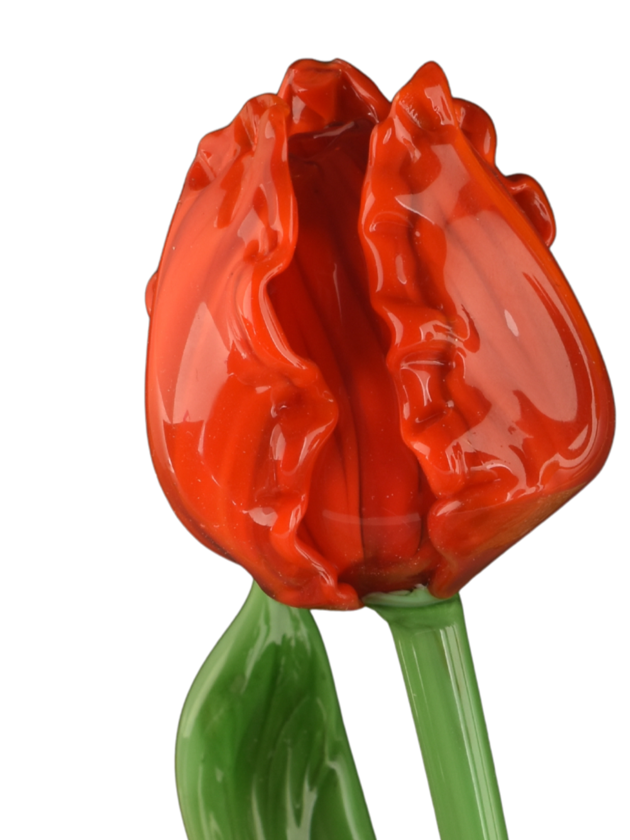 Close-up of a red, glossy, ceramic tulip with green ceramic leaves.