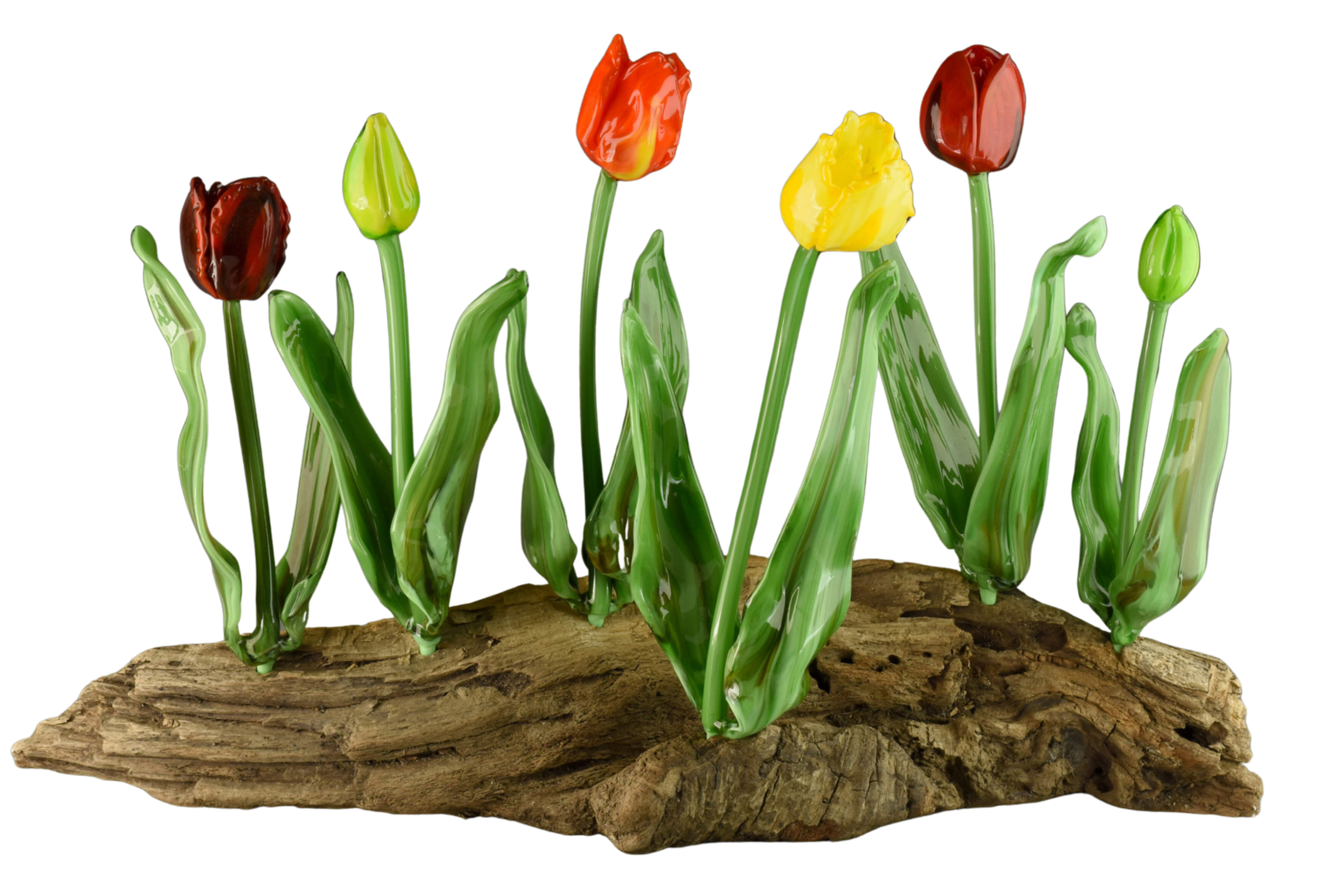 Colorful glass tulips in red, yellow, and green on a log base.