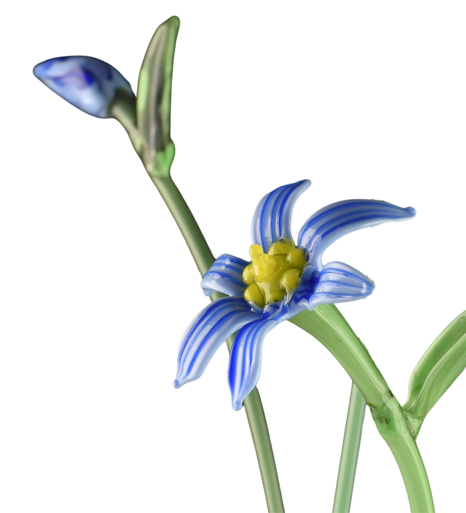 Detailed glass sculpture of a stylized blue and white flower with green stems against a black background.