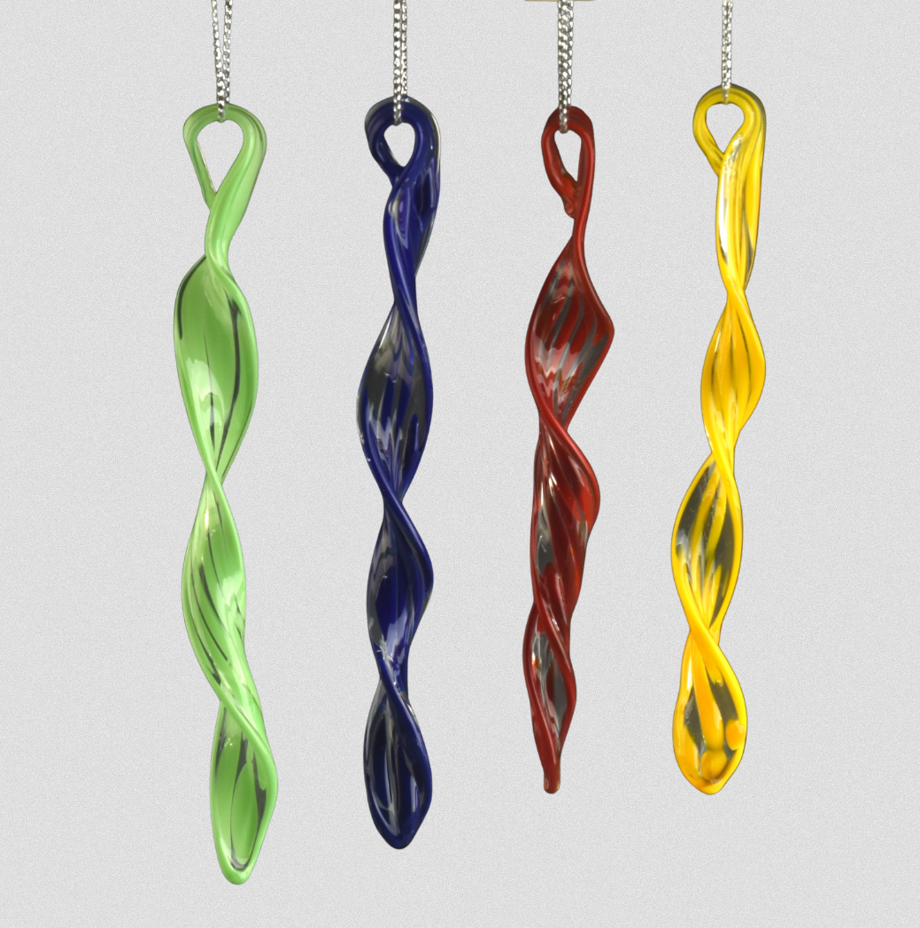 Four colorful glass icicles — twister sculptures hanging from silver chains, in green, blue, red, and yellow colors.