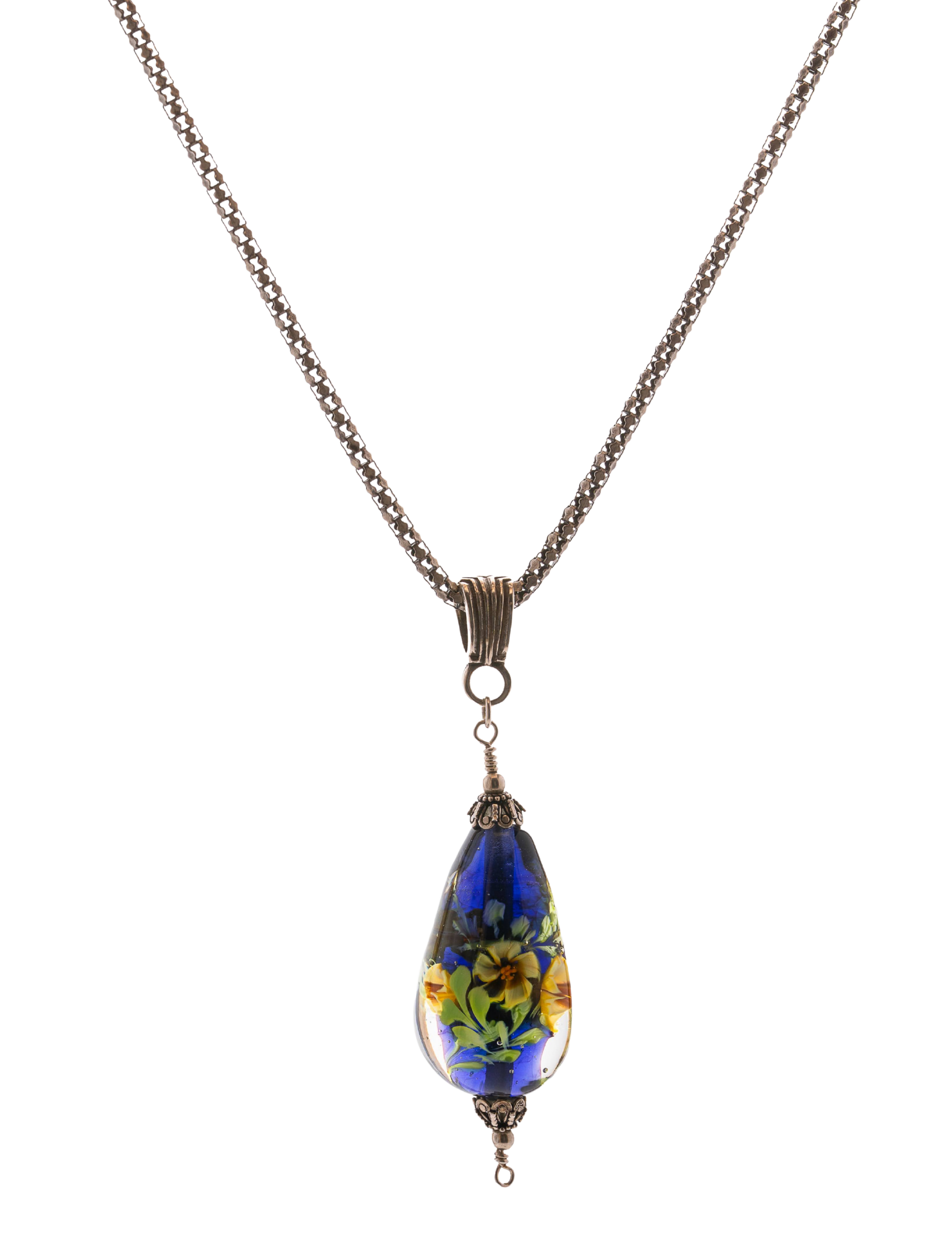 A silver necklace with an elongated teardrop-shaped pendant featuring a floral design in blue, yellow, and green colors.