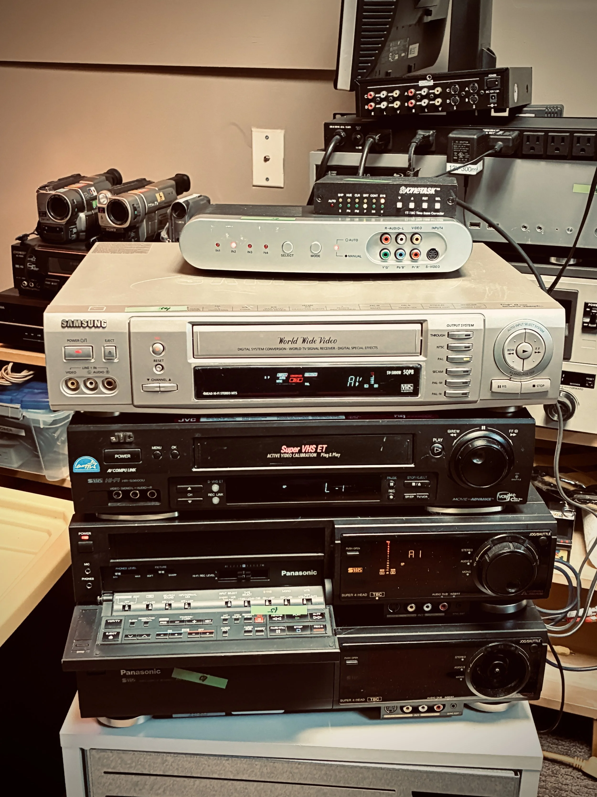 An impressive stack of VCRs, camcorders and video capture gear at Cygnals Multimedia in London, Ontario.