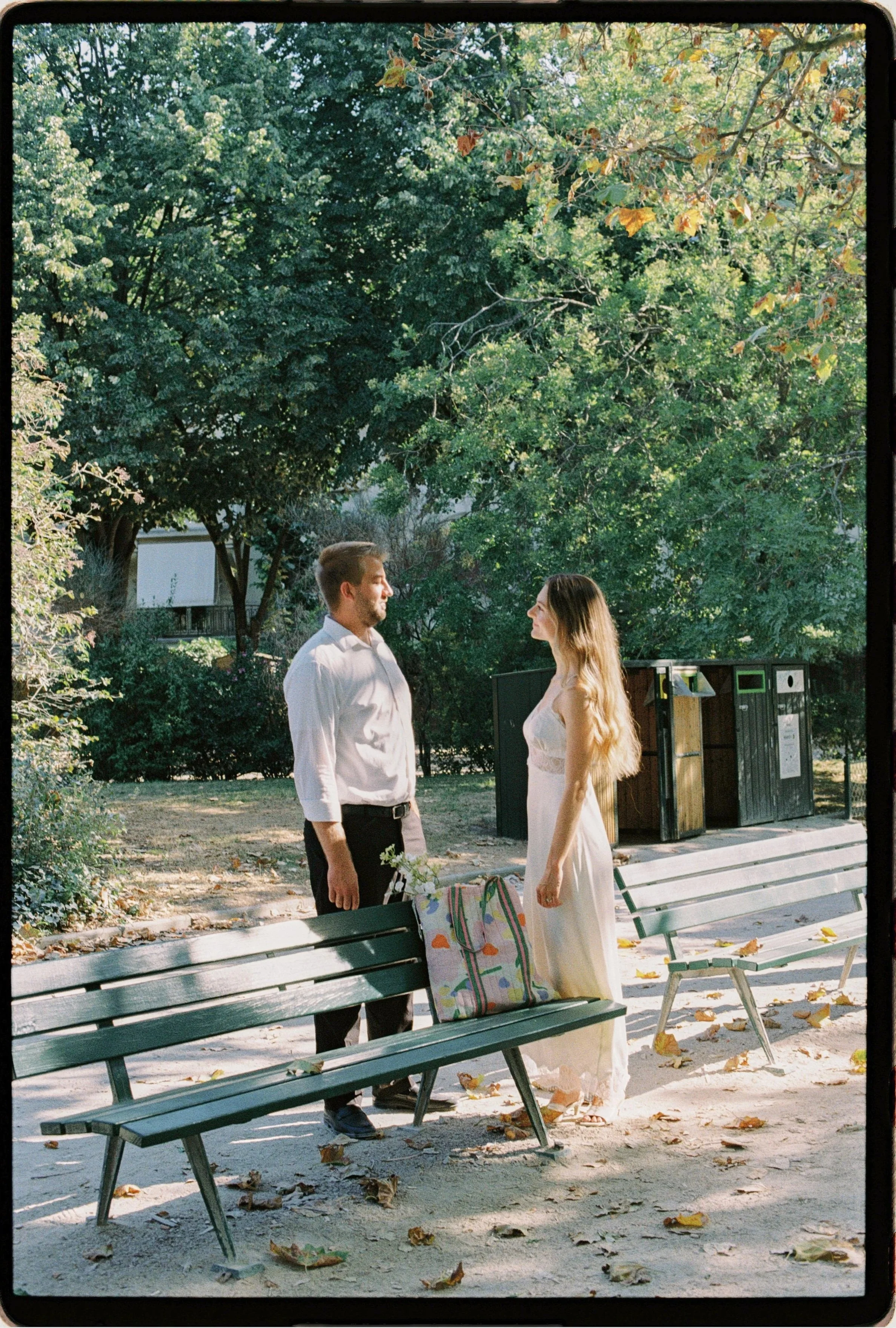 Candid engagement photos in Champ de Mars, Paris couples photographer