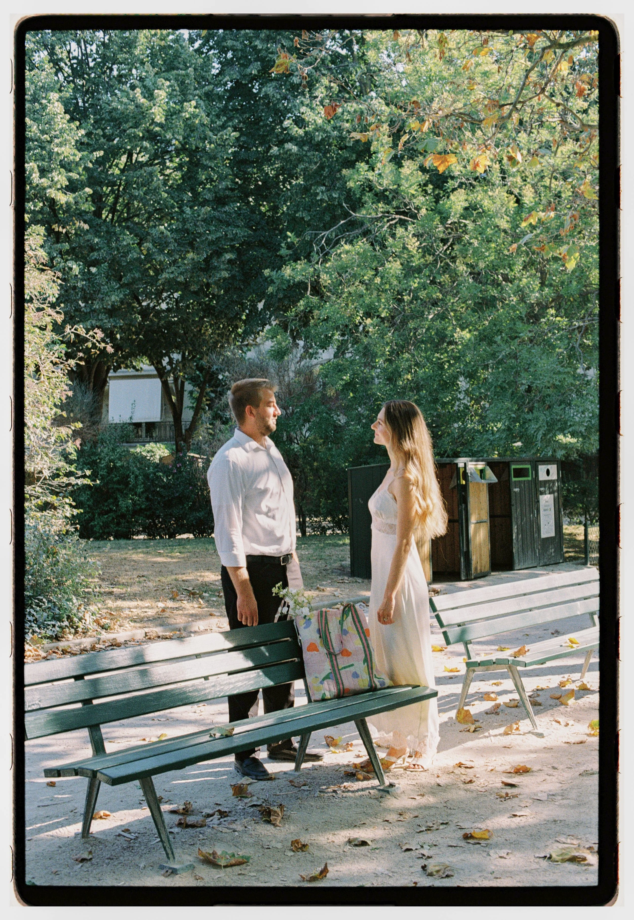 Engagement couples photoshoot in Paris on film and digital. Champ de Mars, Eiffel Tower. Wedding photography, Europe, destination weddings. Summer film photos.