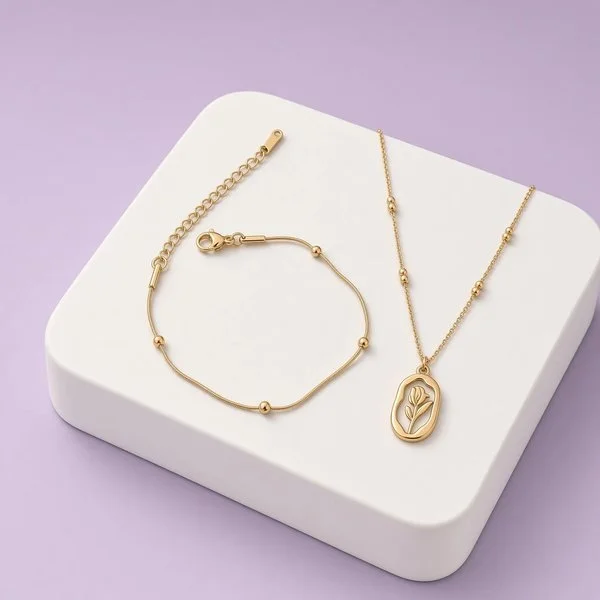 Christmas Box Seven: gold-plated tulip pendant necklace with bead details and beaded chain bracelet