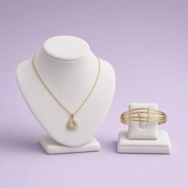 Christmas Box Five: gold-plated triangle pendant necklace and multi-strand bangle