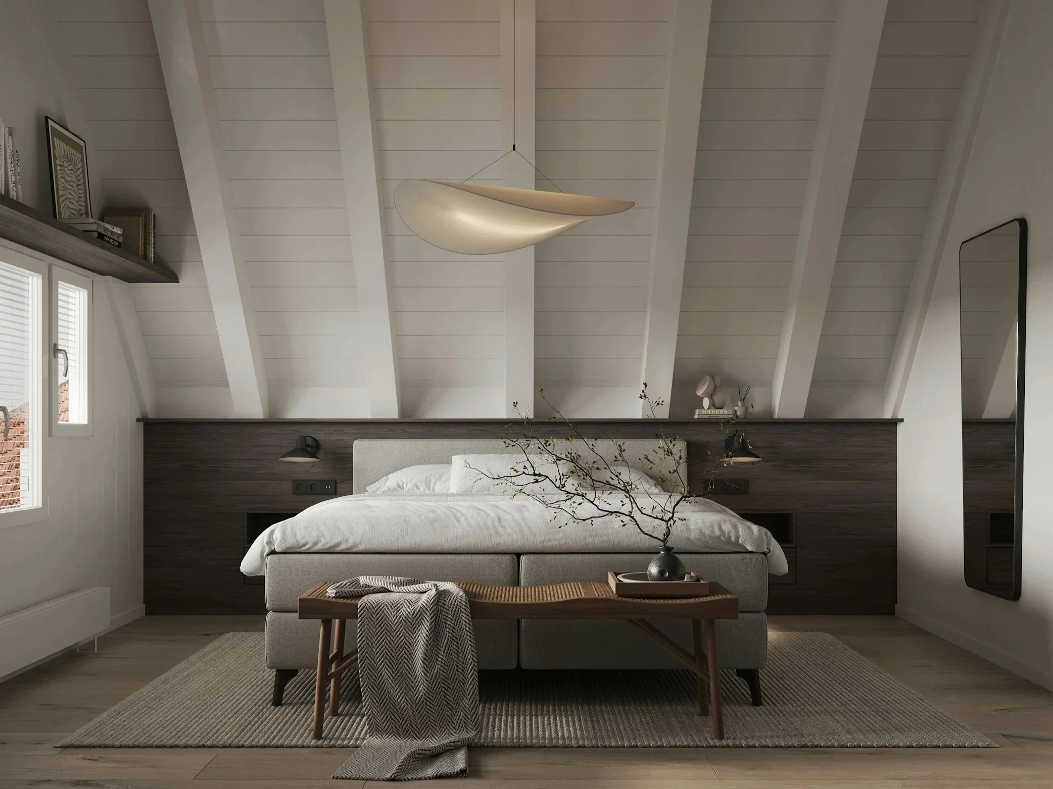 A modern bedroom with a sloped ceiling, a bed with white bedding, a wooden bench with a blanket, a vase with branches, and a ceiling light fixture.