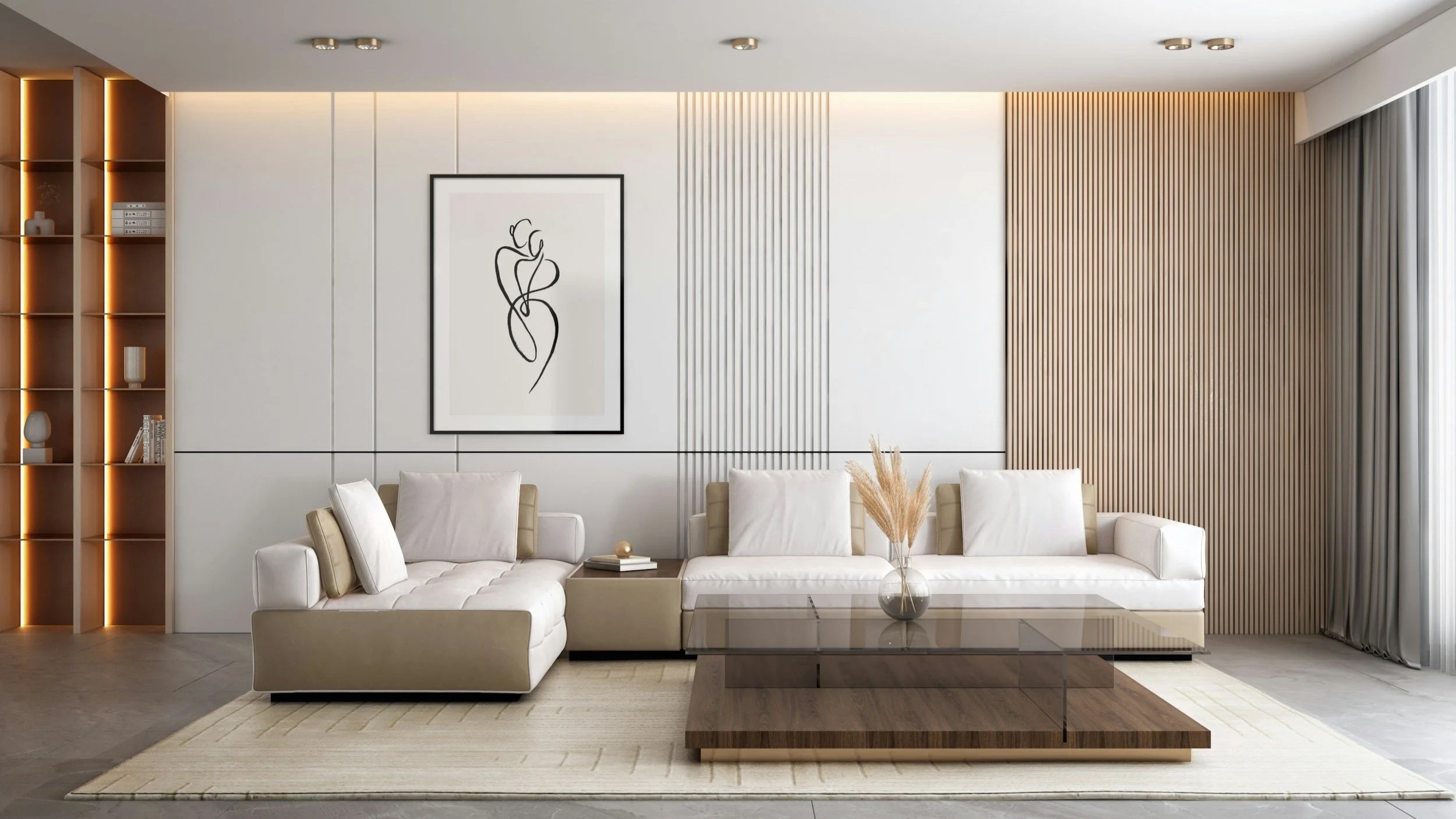 Modern living room with white sofas, a glass and wood coffee table, and vertical wooden slats on the wall. Decorative items and books on a tall bookshelf to the left, and a framed line art picture above the sofas.