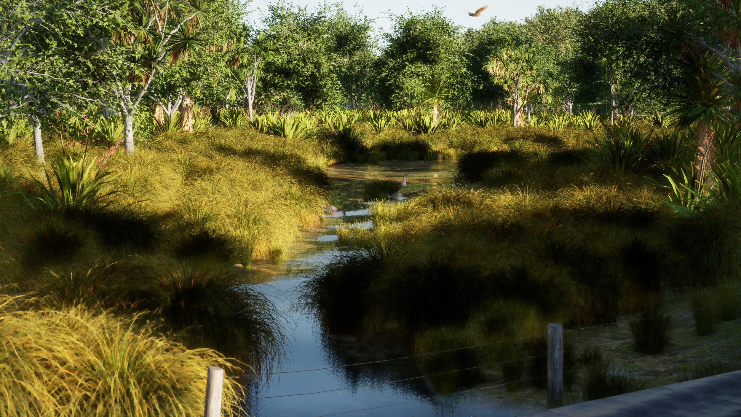 A lush wetland with a small meandering stream, surrounded by dense green and yellow grass, trees, and shrubs. Ducks are swimming in the water, and a bird is flying overhead. A fence is visible in the foreground.