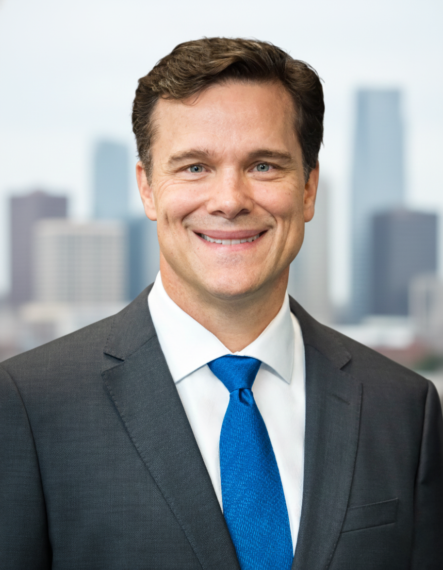 Russ Reeder in a suit and tie