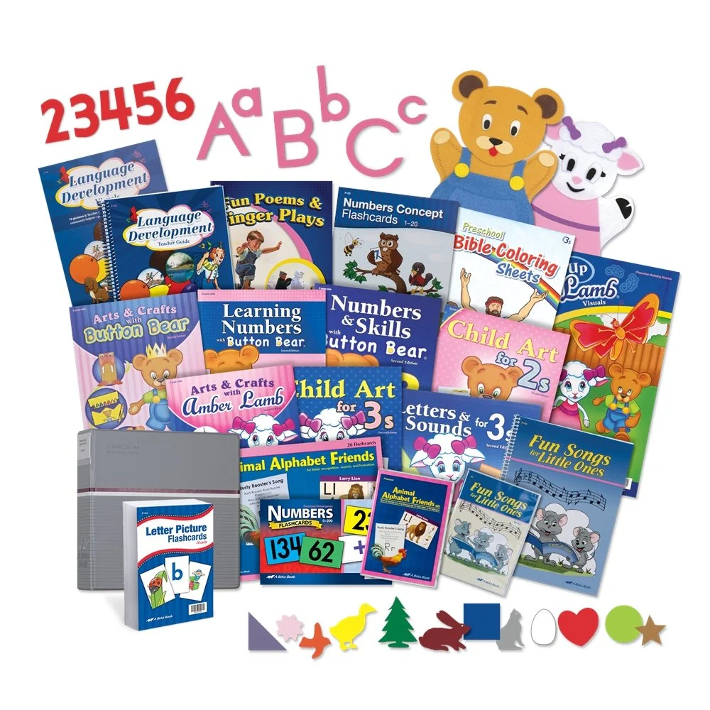A collection of preschool educational books, flashcards, and craft supplies, including alphabet and number learning materials, with two cartoon animal characters in the background.