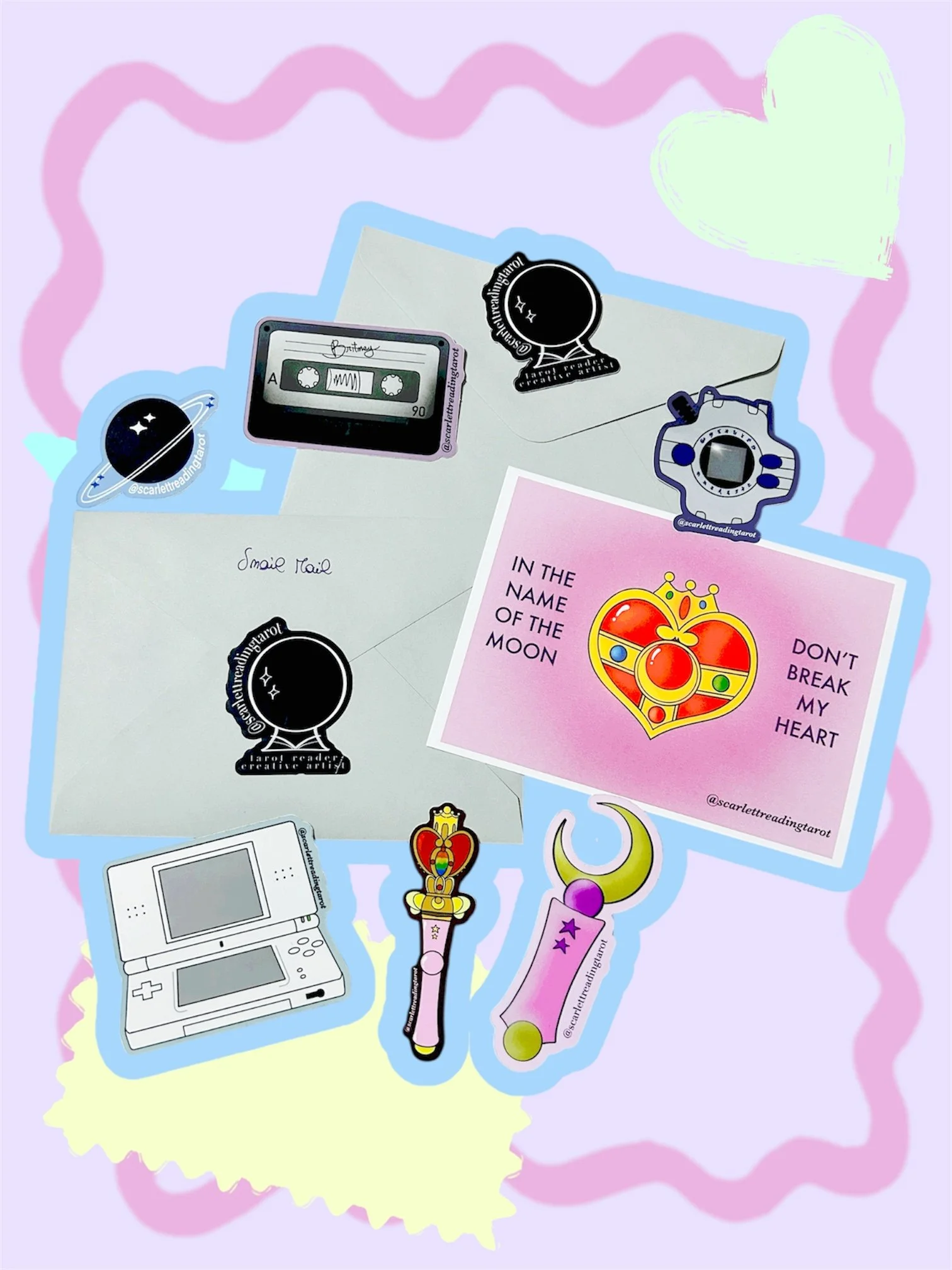 Collection of colorful stickers on purple, yellow, and pink background, including a cassette tape, a planet, a heart with crown, a game console, a unicorn, and other whimsical designs.