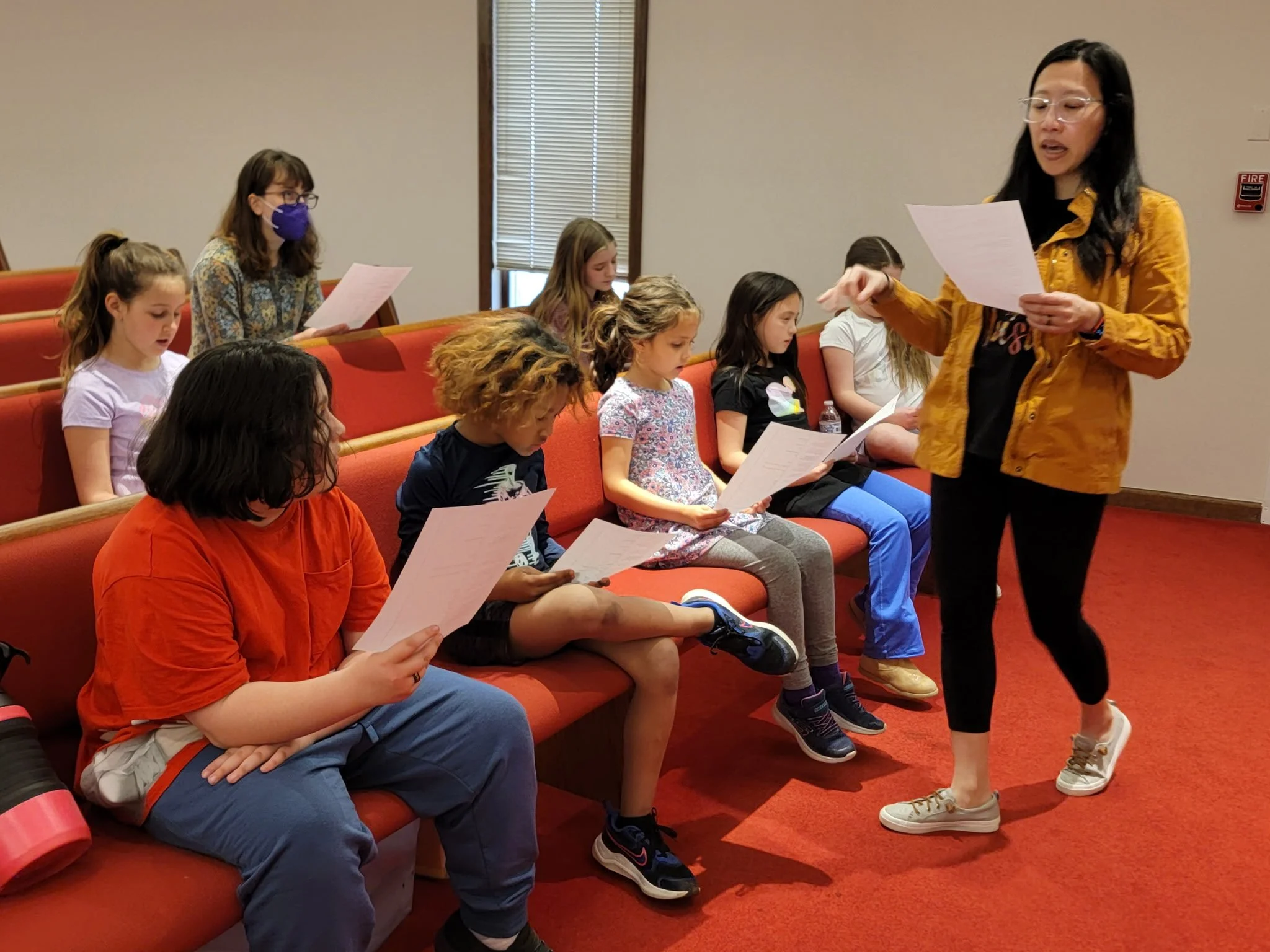 Dr. Hu rehearsing with the singers of HVVH