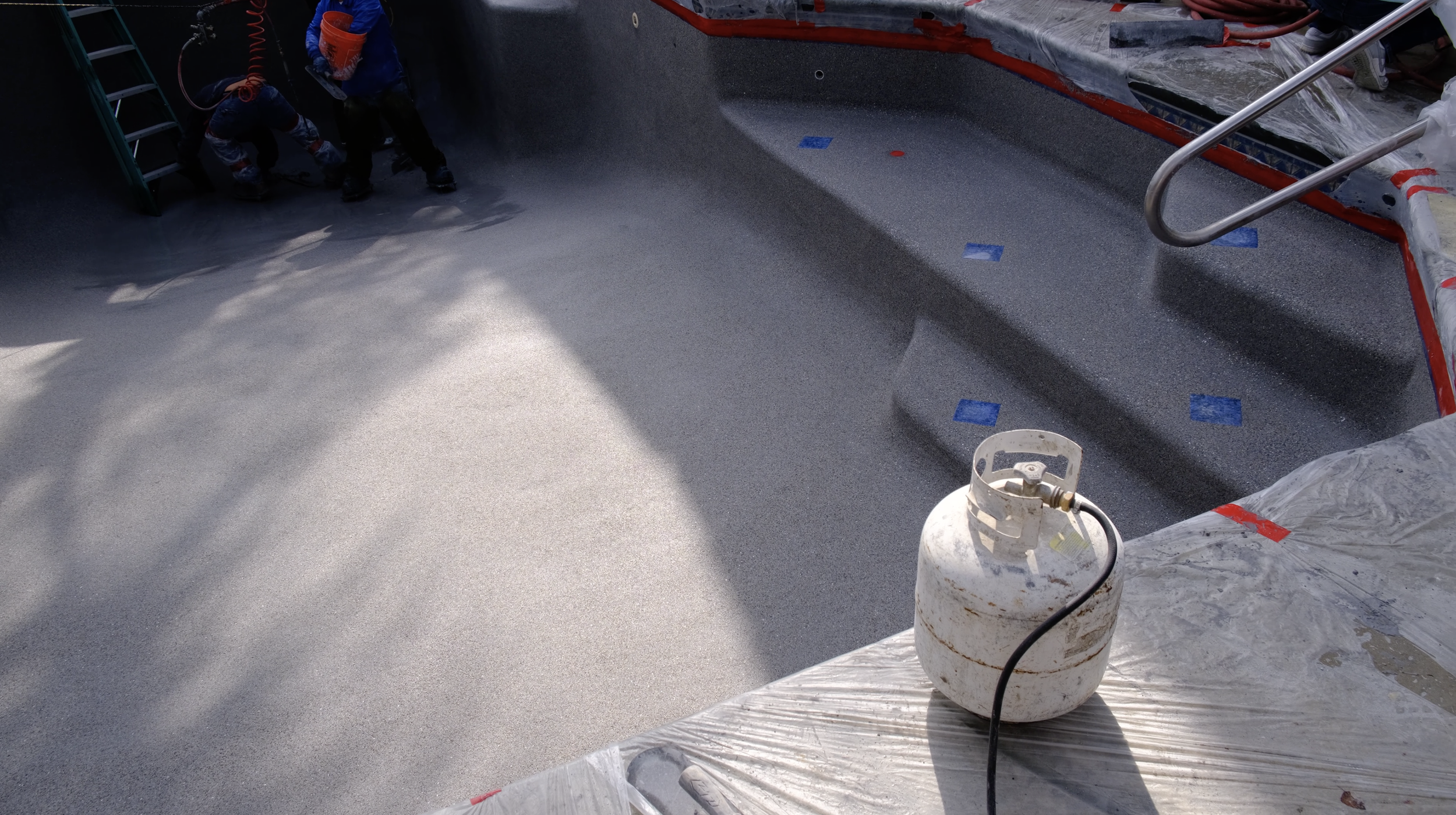 Pool resurfacing with aggregate finish application by NorCal Pools Inc in Northern California