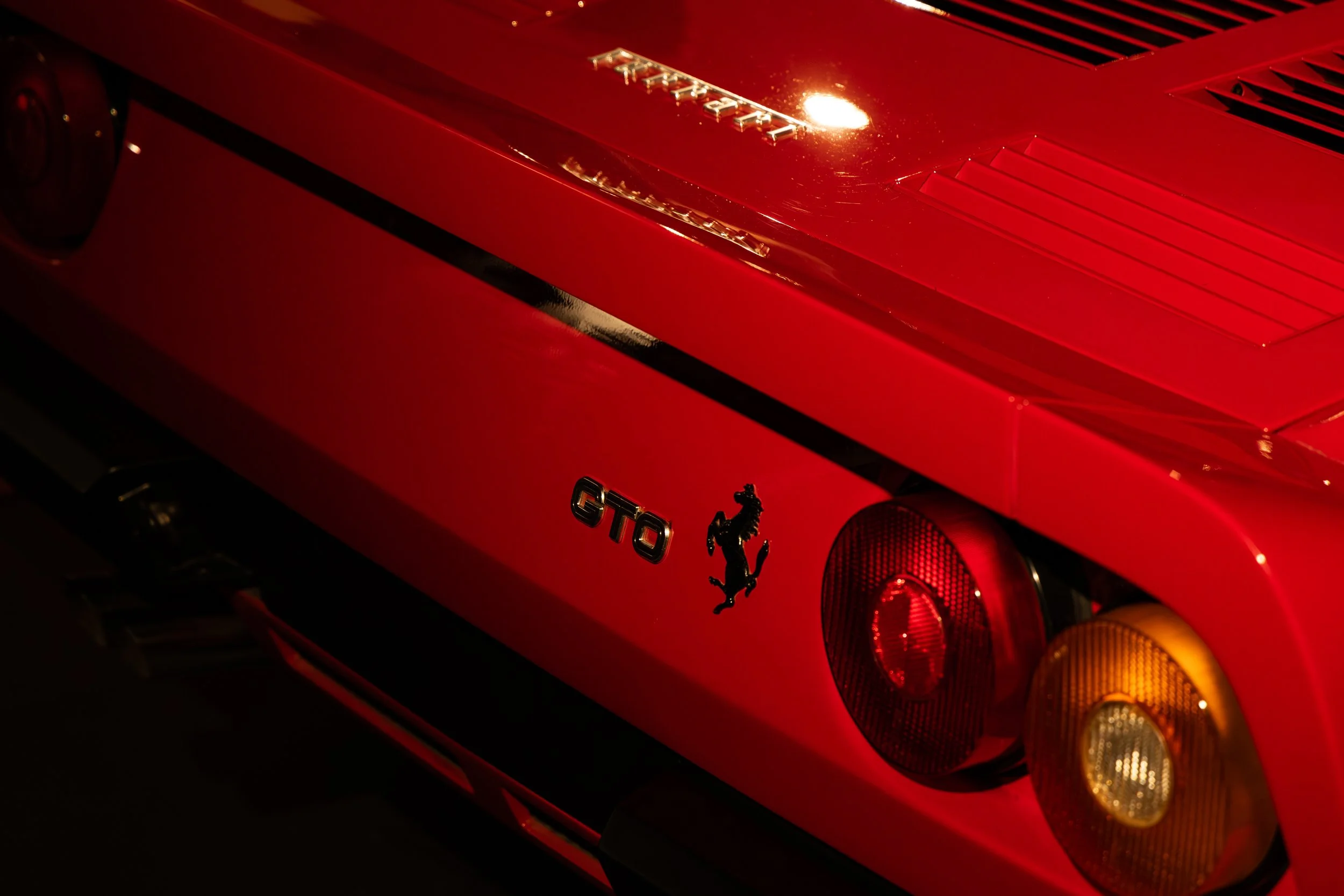 Close-up of the right rear side of a Ferrari 288 GTO at the Ferrari museum in Maranello.