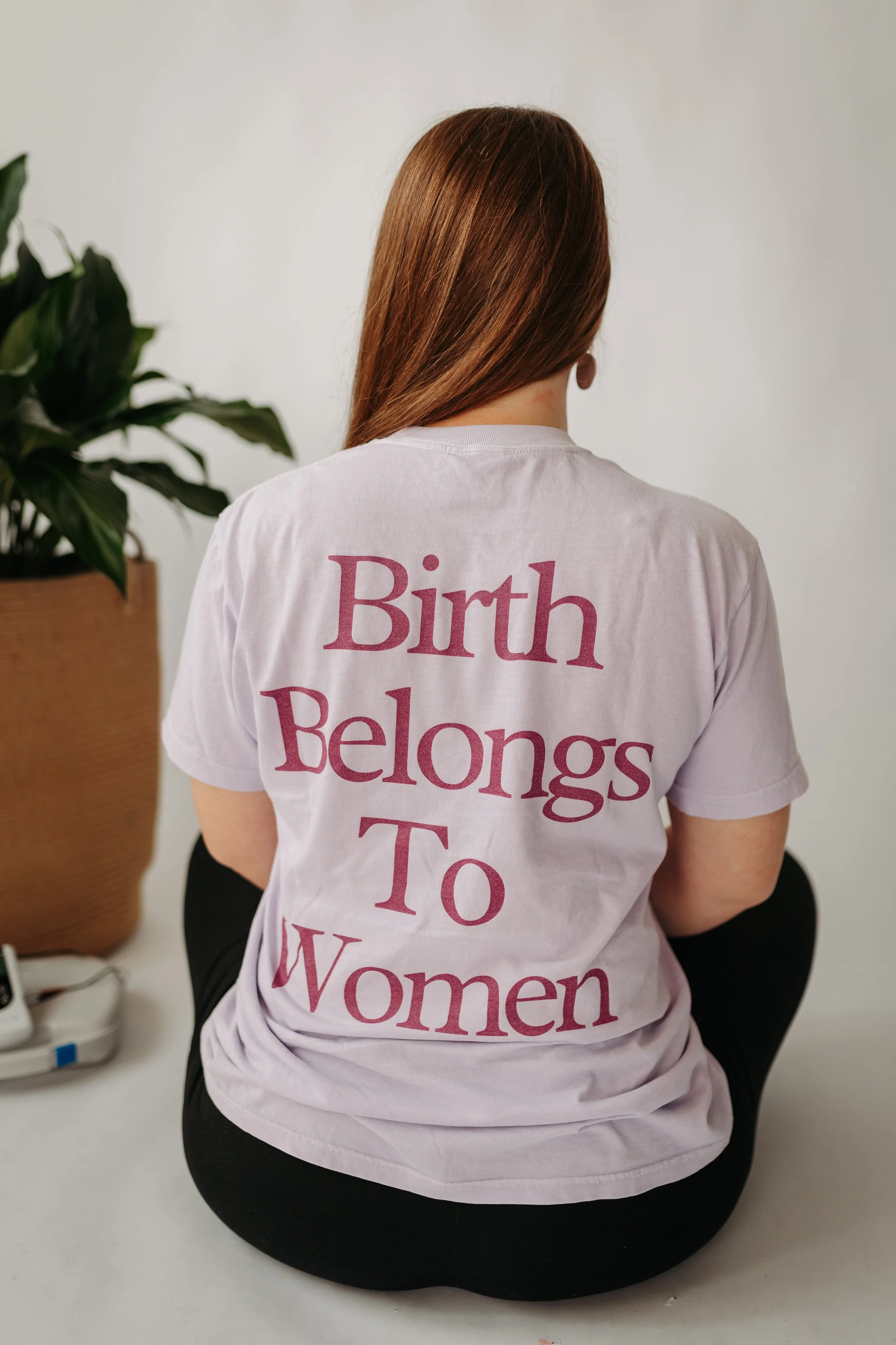 Brook + Brave Birth - Memphis, Tennessee Birth and Postpartum Doula wearing a Birth Belongs to Women shirt