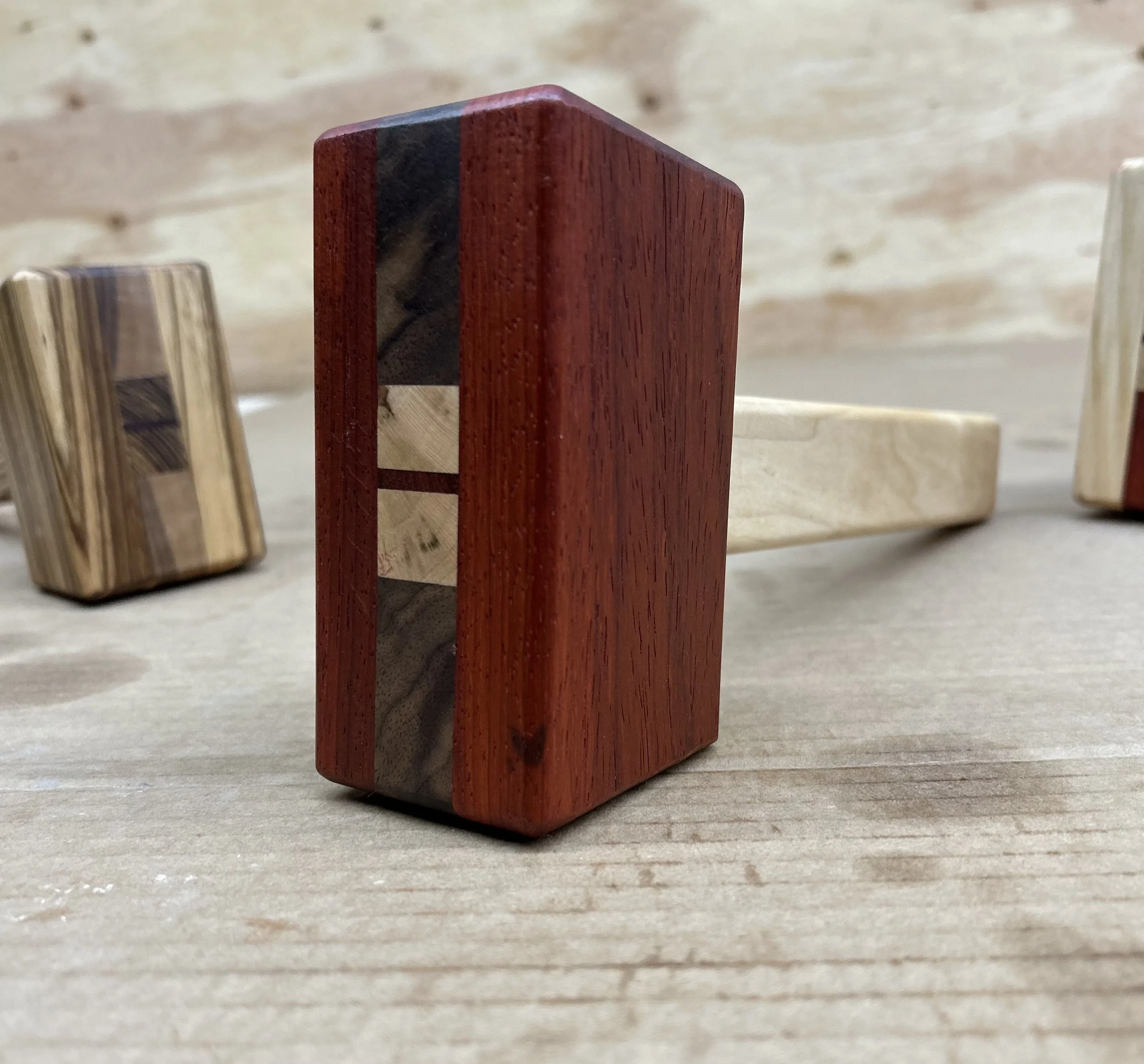 Close-up of wooden mallet.