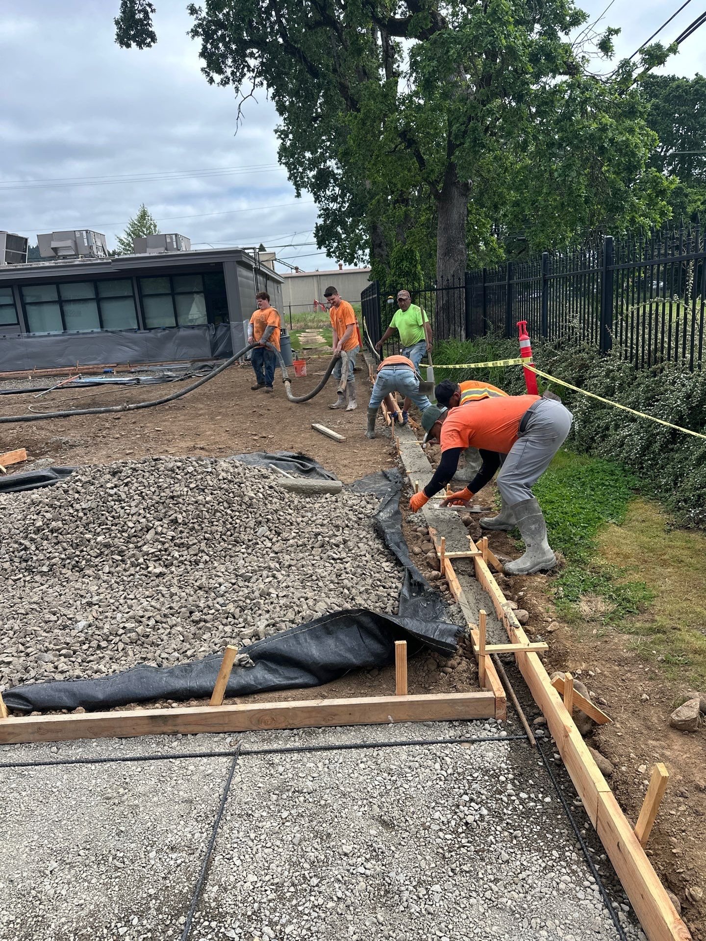 concrete-crew-placing-curb-pour-oregon-military-museum-left-coast-gc.jpg