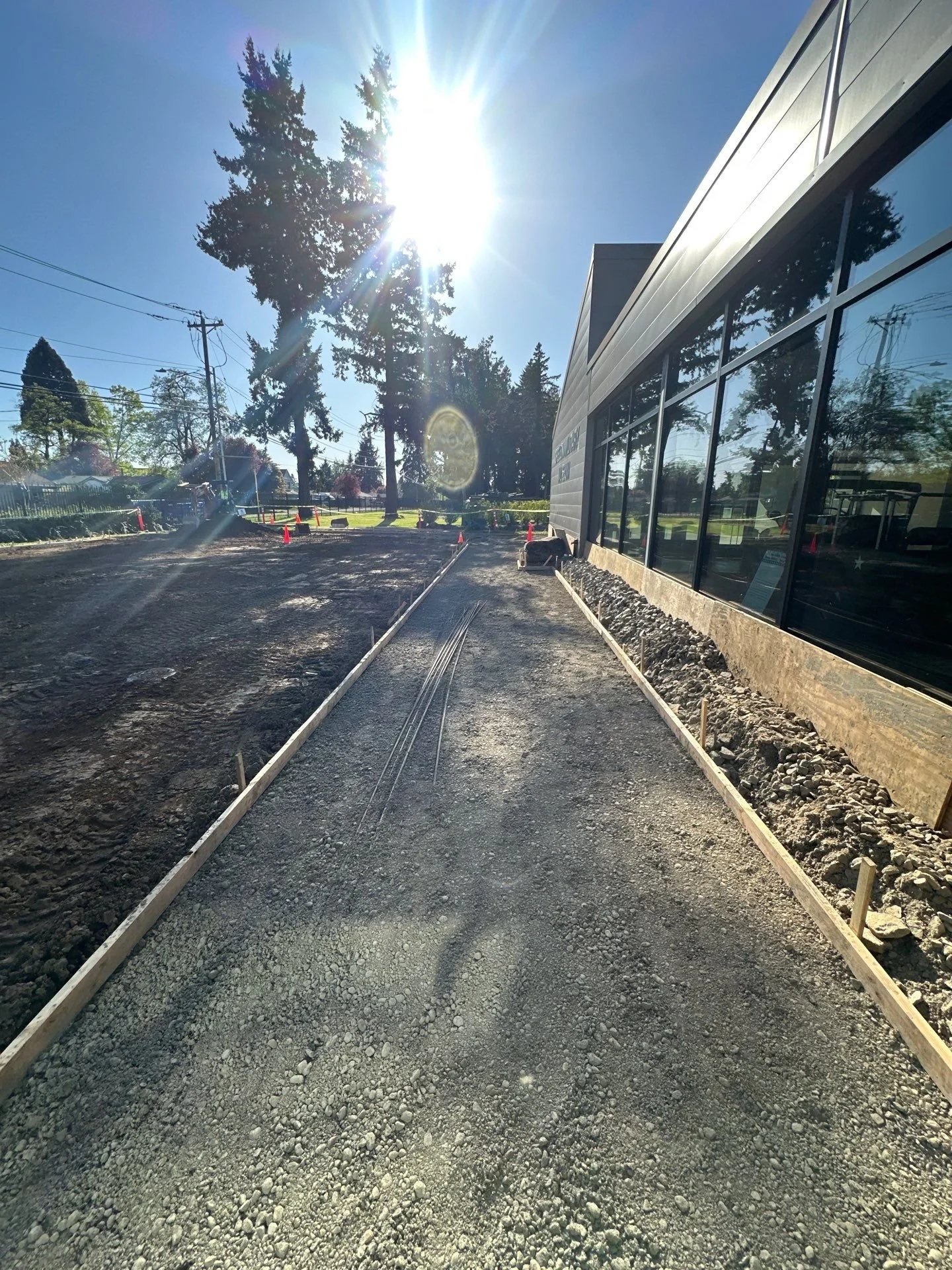 formed-sidewalk-rebar-along-building-oregon-military-museum-left-coast-gc.jpg
