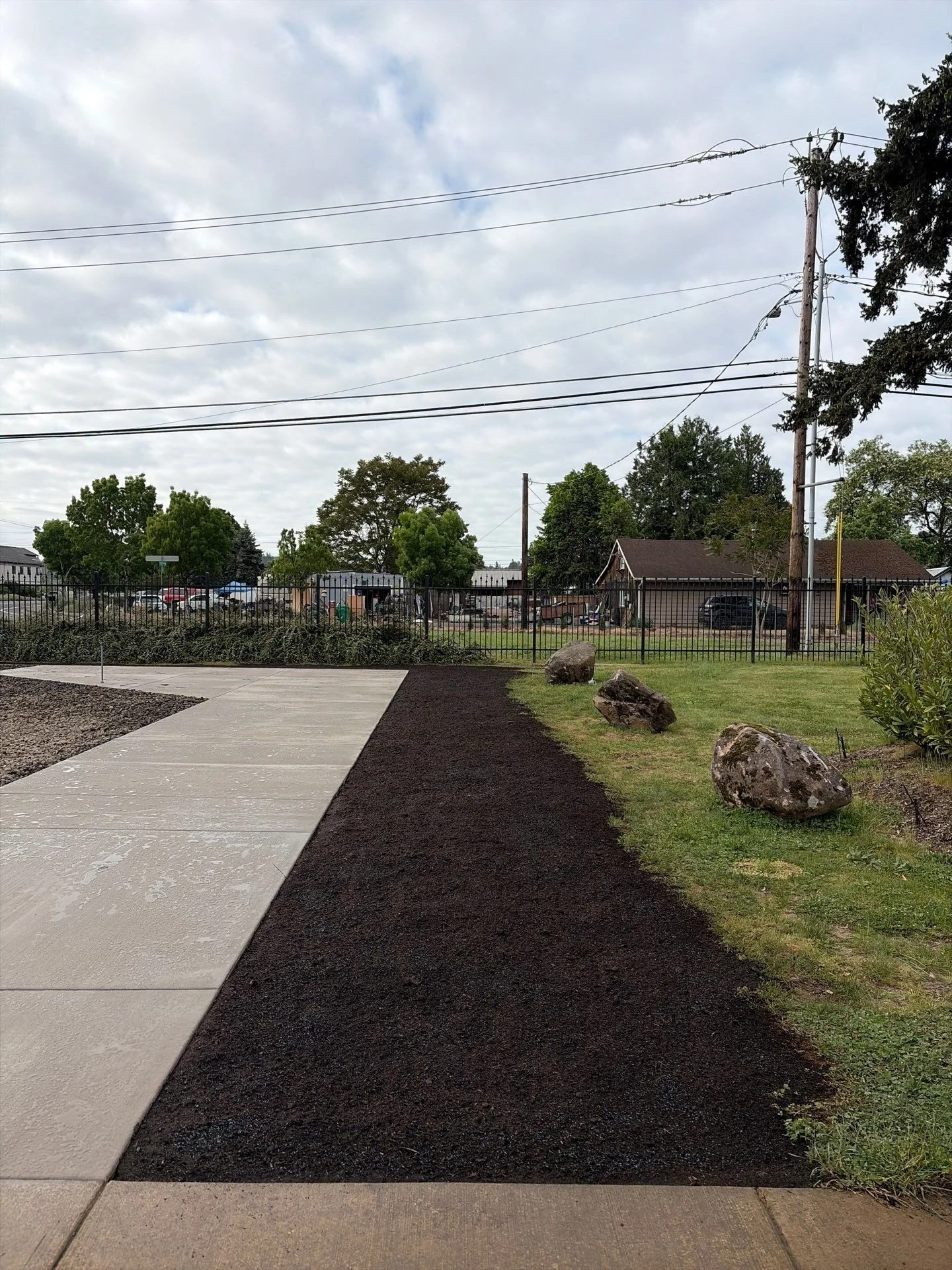 bark-mulch-bed-boulders-along-walkway-oregon-military-museum-left-coast-gc.jpg