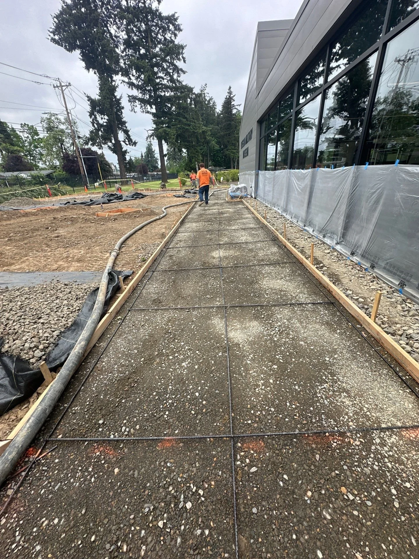 poured-concrete-walkway-building-perimeter-oregon-military-museum-left-coast-gc.jpg