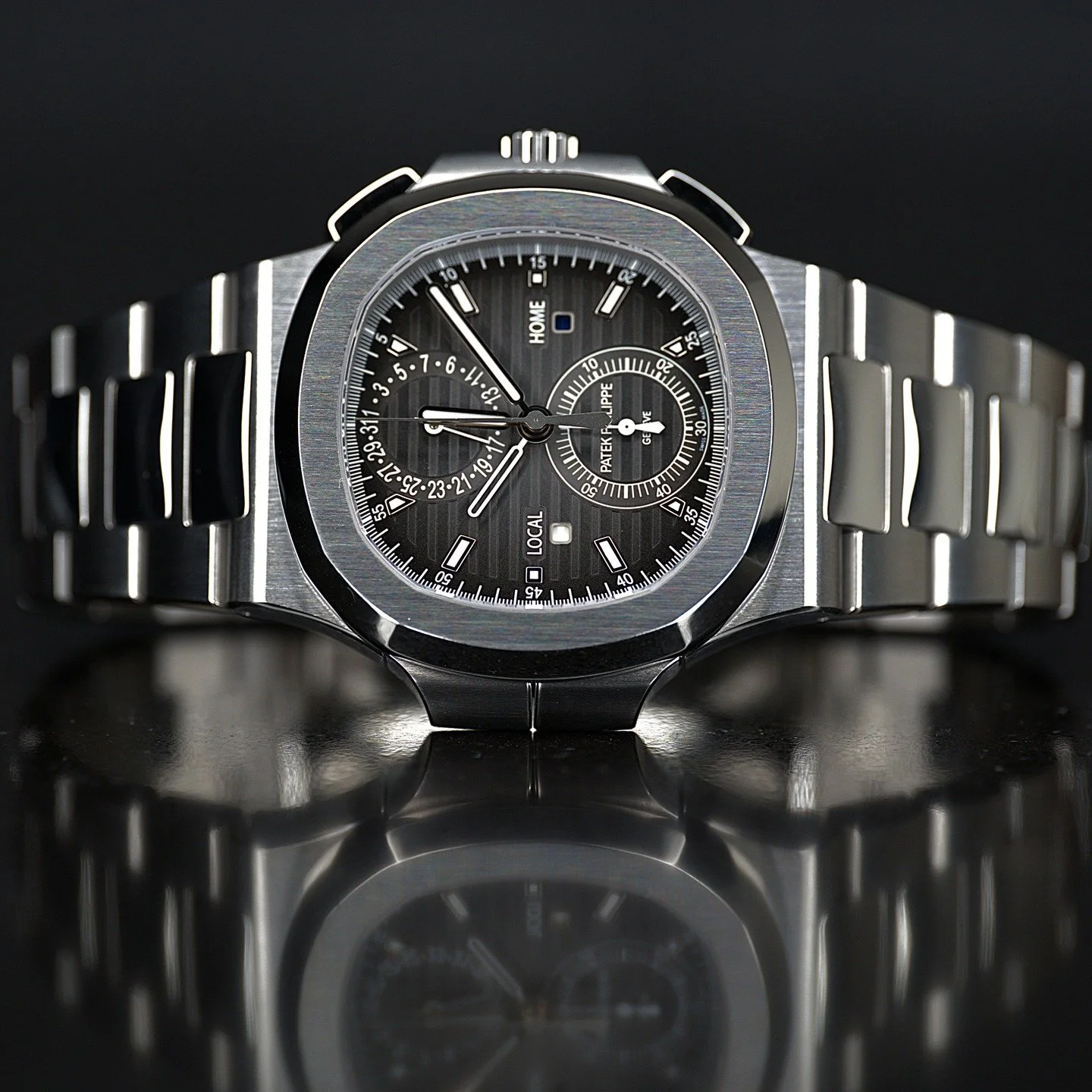 A luxury wristwatch with a black dial, silver case, and metal bracelet, featuring multiple sub-dials, date indicators, and chronograph functions.