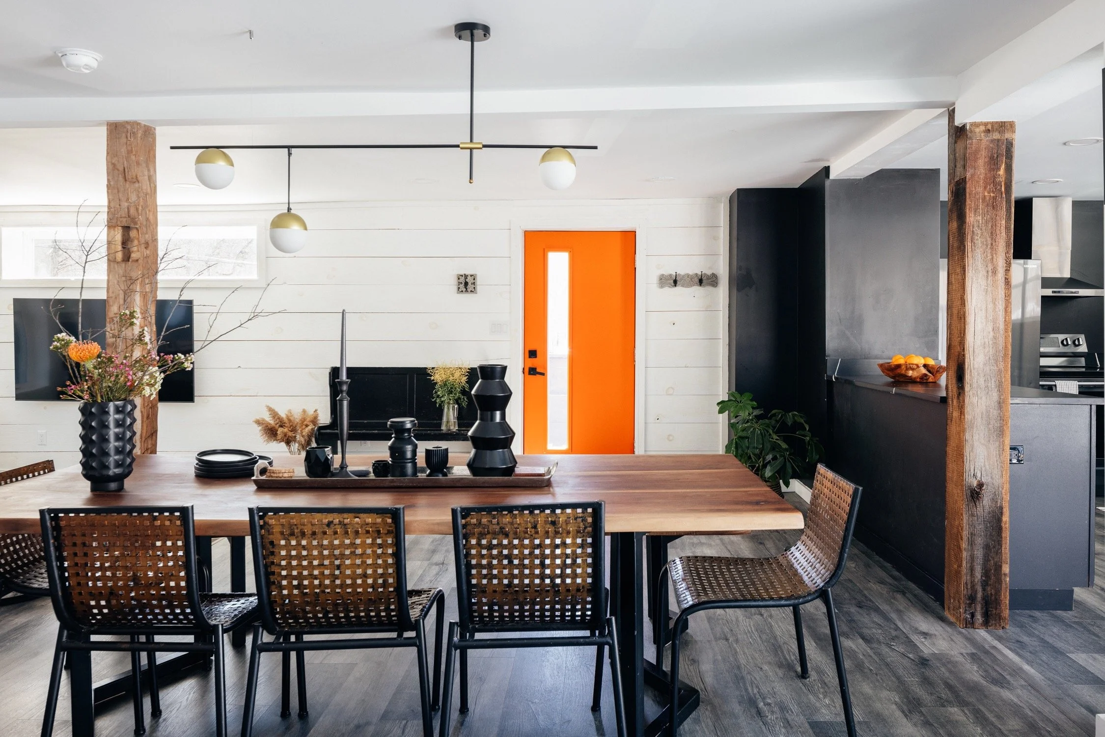 Modern dining room with wooden table, which can comfortably sit 8 guests at this catskills getaway perfect country getaway close from Livingston Manor NY