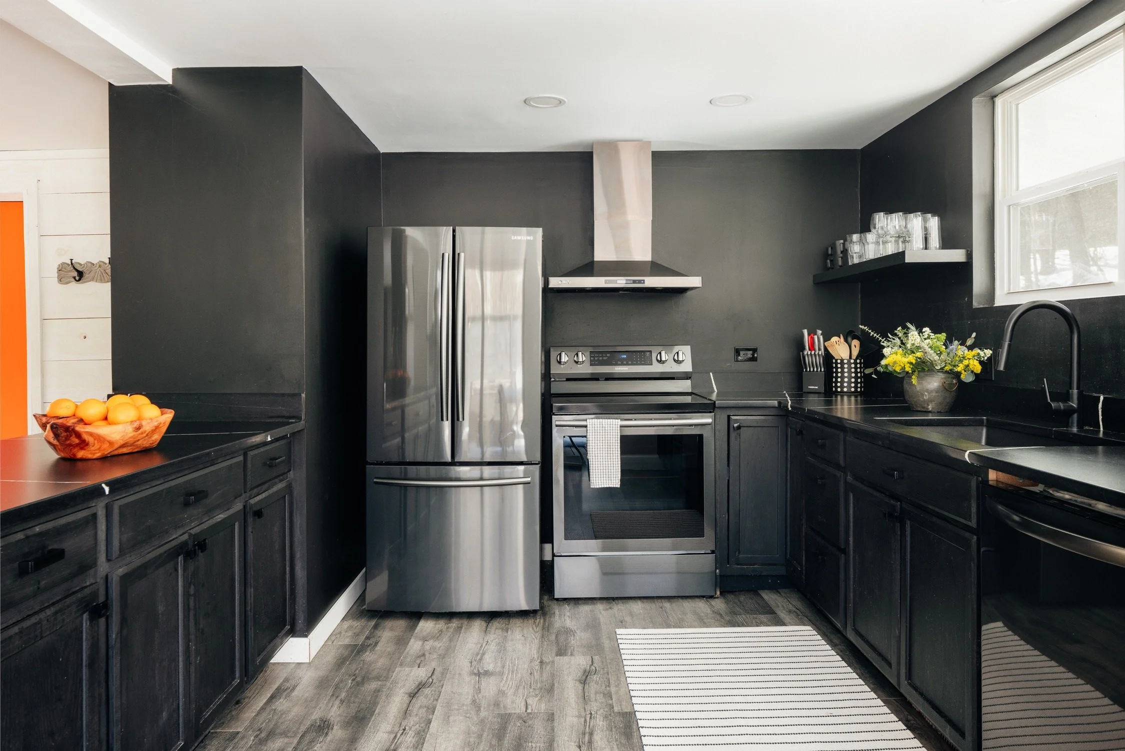 Renovated chef’s kitchen at Black Bear Cottage – Catskills cabin rental with full gourmet kitchen, a window with natural light, a delight for friends and family who enjoy cooking together- Ideal chefs' retreat in the catskills